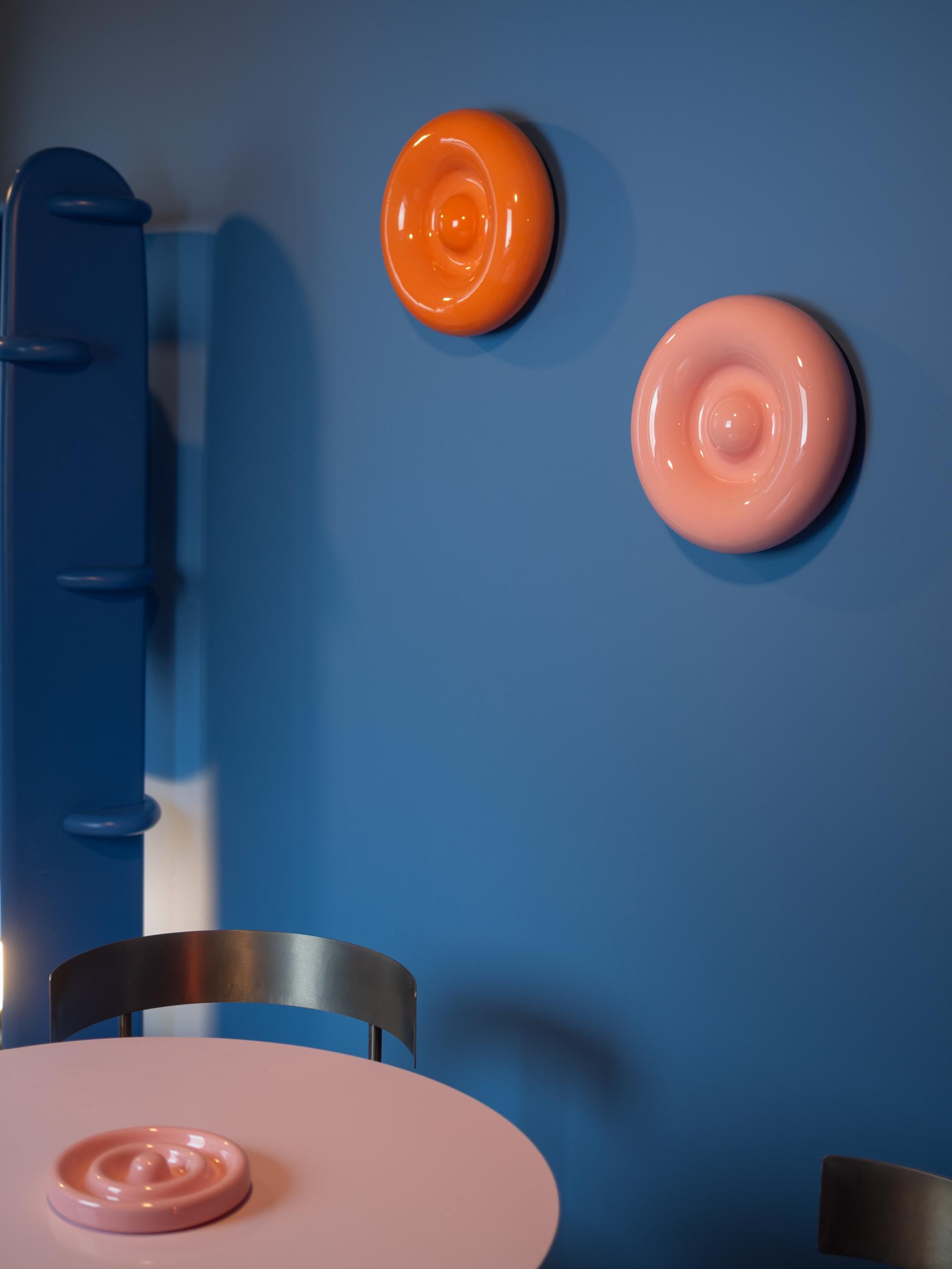 Candy colour and curves for Nodi ceramics studio & workshop by Franz Brannaschk.