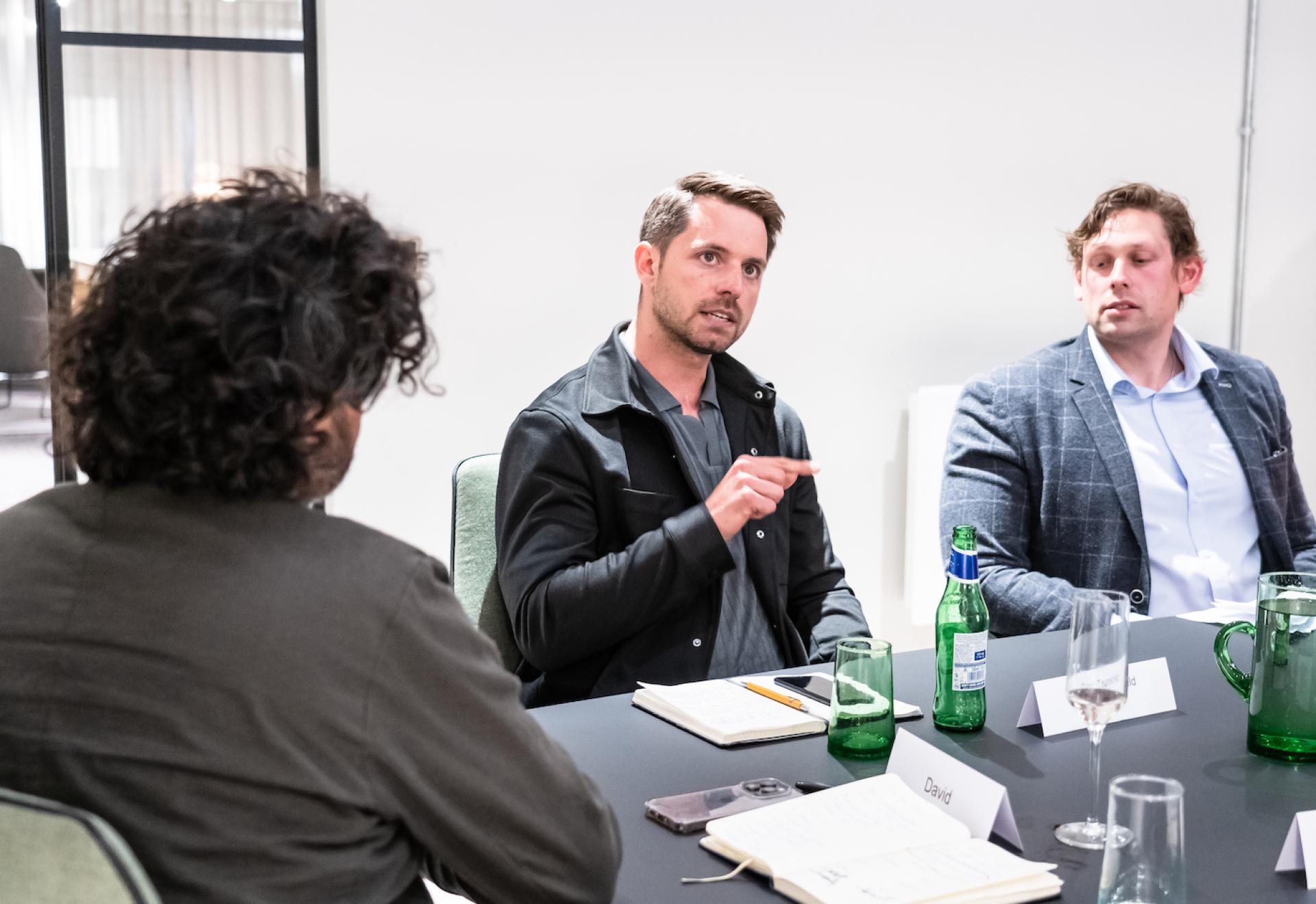 Discussion at a Manchester property seminar with participants exploring co-living and BTR market trends.