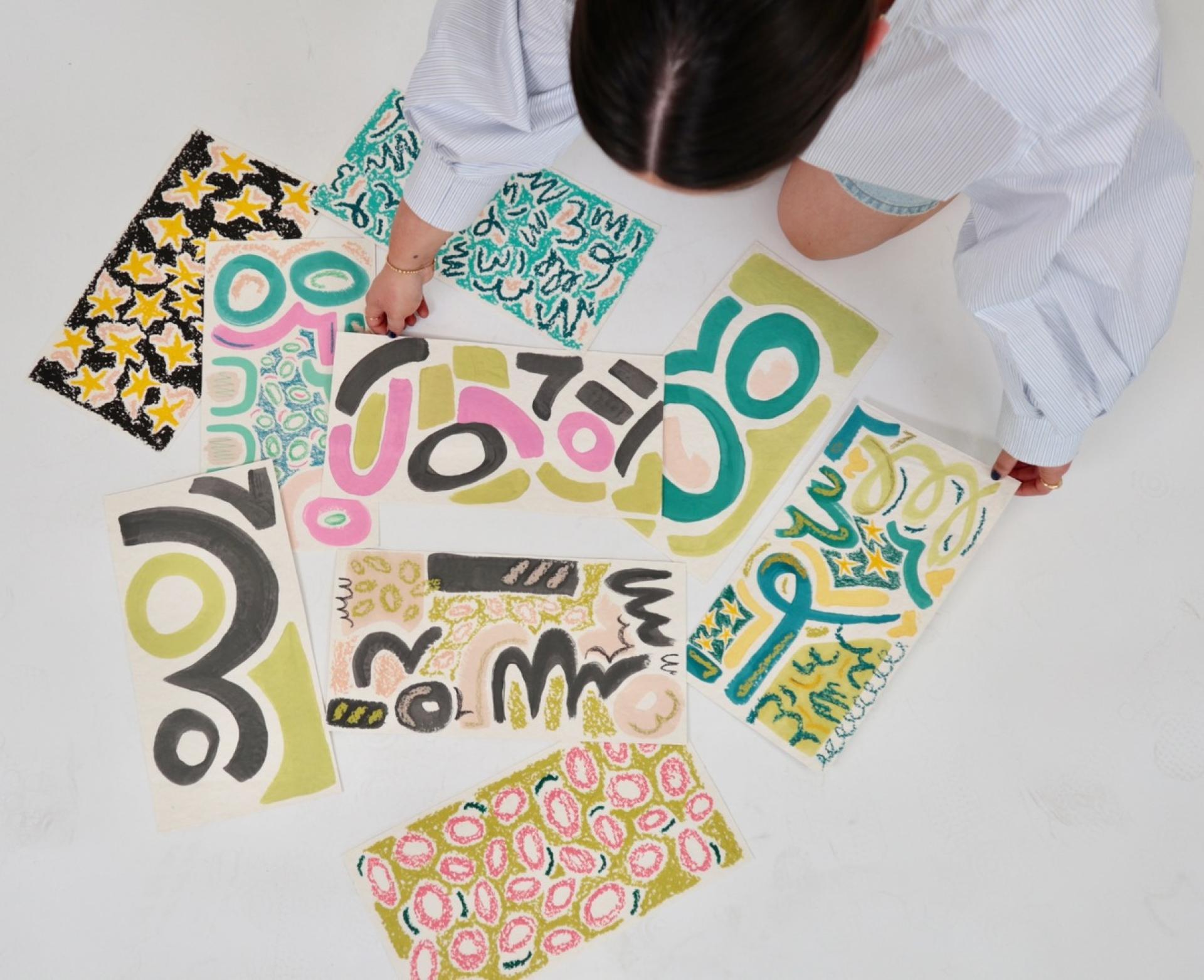 Creative artwork featuring vibrant patterns and colors created by Manchester School of Art graduates, showcasing their artistic talents.