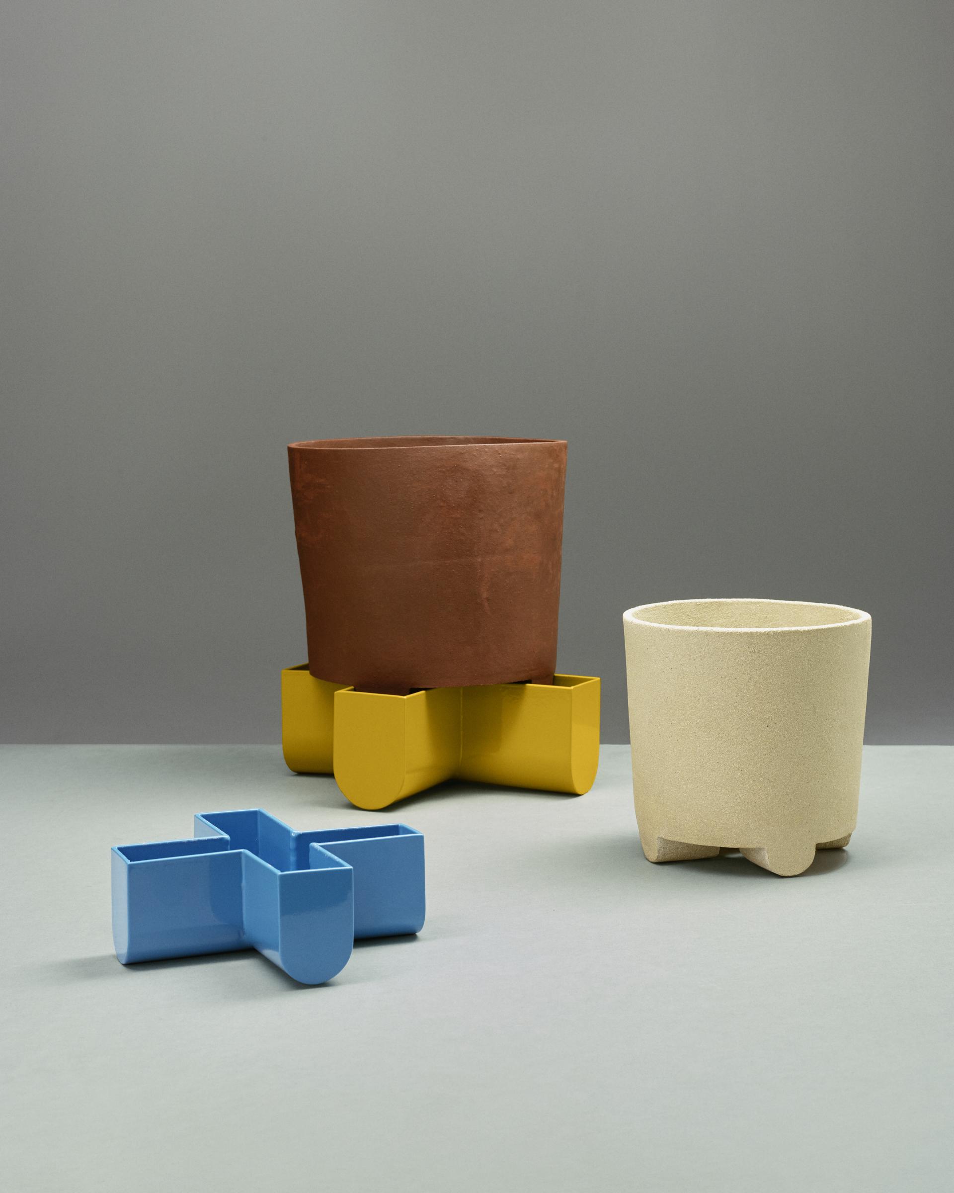 Colorful planters showcasing circular design and materiality, featured at Norwegian Presence 2023 during Milan Design Week.