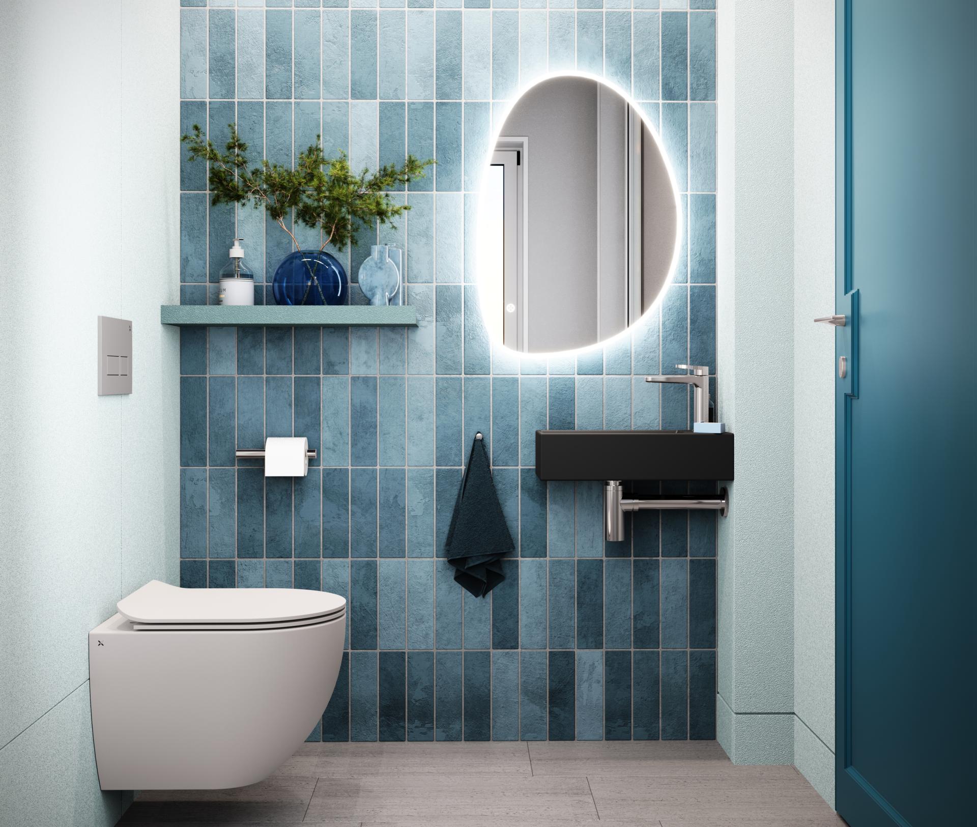 Bold bathroom design featuring teal tiled walls, modern fixtures, and a stylish illuminated mirror.