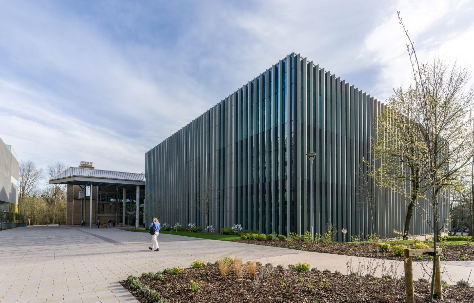 Renovated building at Alderley Park featuring modern architecture and surrounding greenery, highlighting SpaceInvader's innovative design.