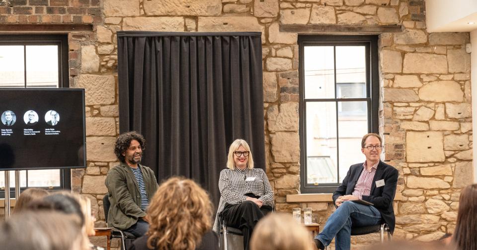 Panel discussion featuring experts at the Glasgow Property Outlook seminar, highlighting insights on local real estate trends.