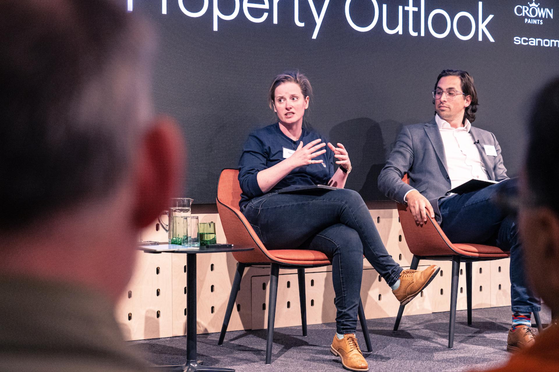 Panel discussion at the Manchester Property Outlook seminar featuring industry experts sharing insights on local real estate trends.