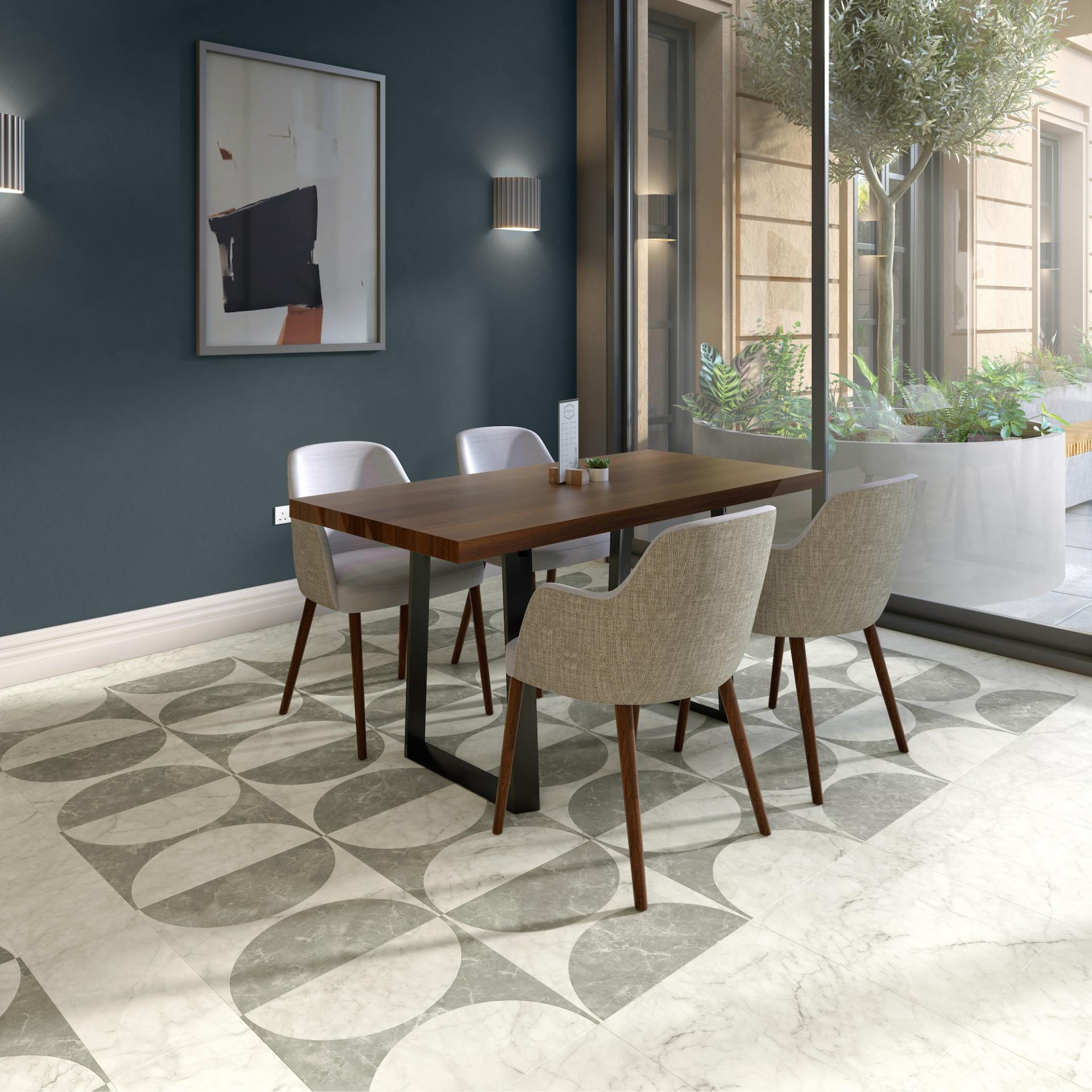 Stylish dining area featuring Amtico's patterned flooring, showcasing modern design and artistic flair in a contemporary setting.