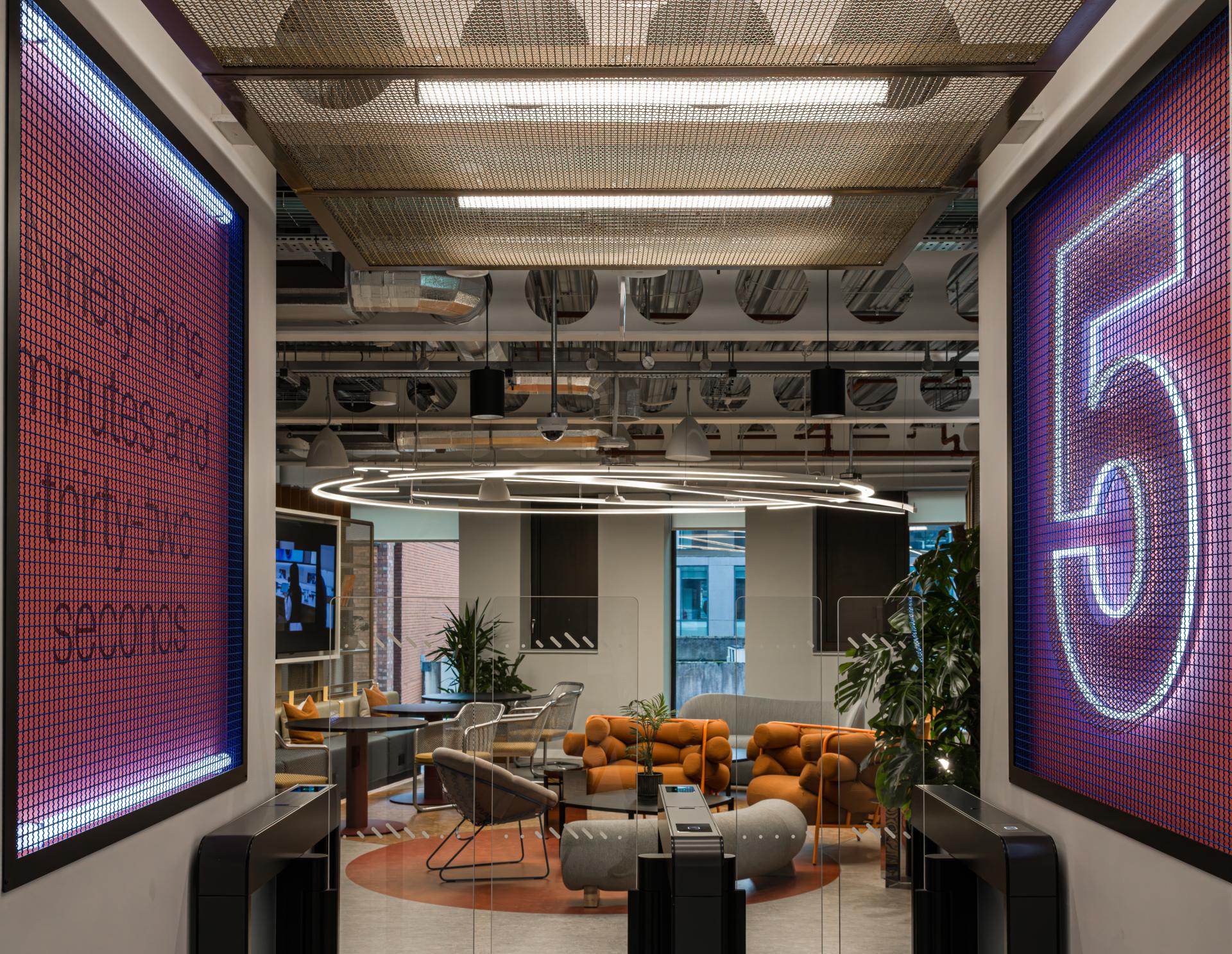 SpaceInvader's workplace scheme for Virgin Media O2 balances vibrancy with variety to support congregation and calm.