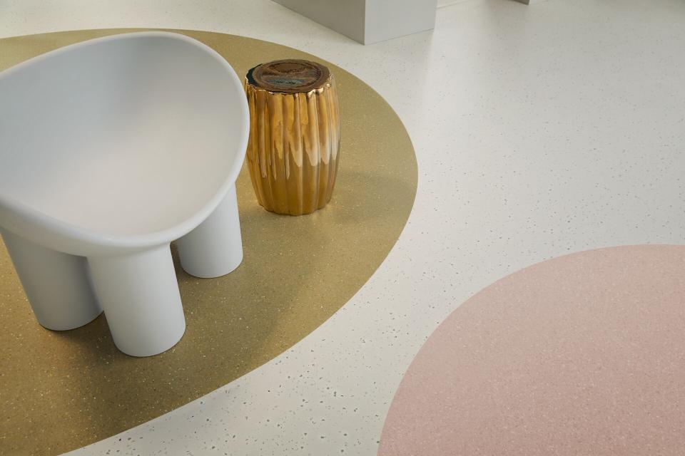 Modern healthcare space featuring Forbo’s high-performance homogeneous vinyl flooring, paired with stylish furniture in soft colors.