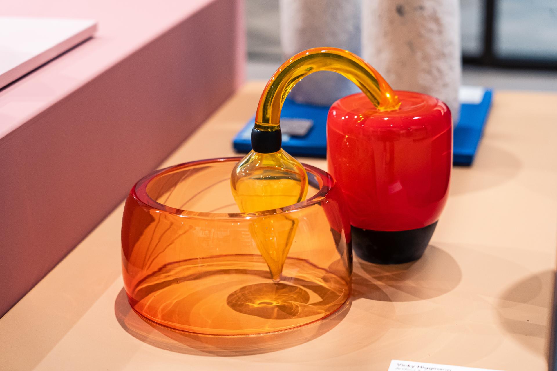 Colorful glass art pieces on display at Material Source Studio showcase craftsmanship and creativity in Scottish design.