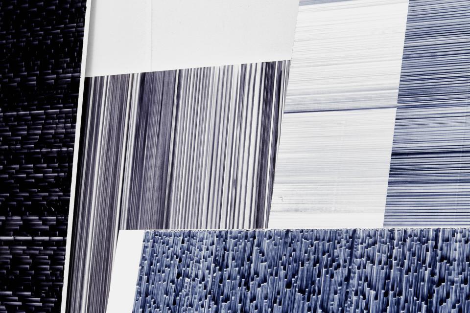 Léa Mazy's innovative tile designs showcase various textures and colors through a unique printing process for the tile industry.