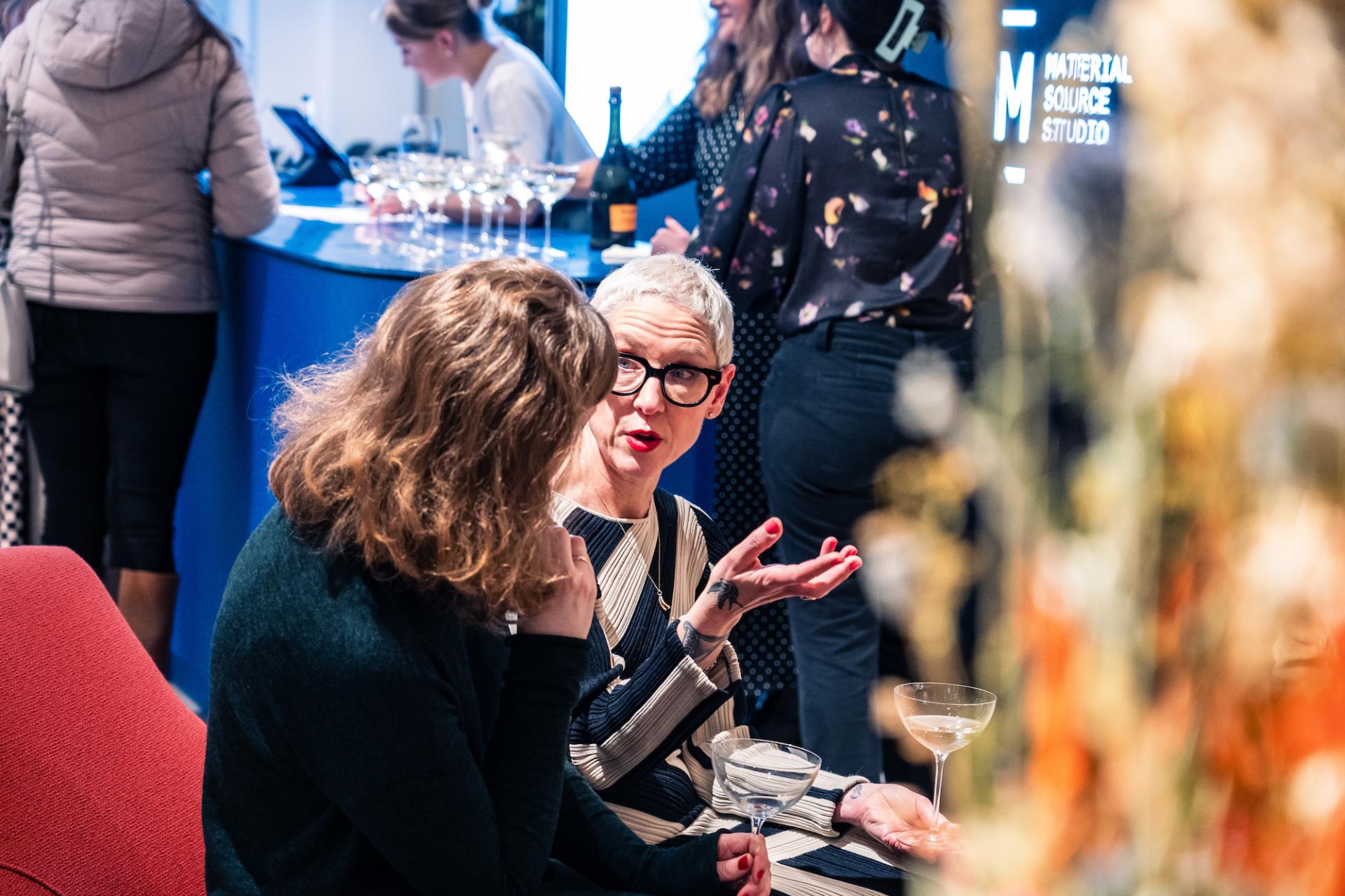 Anna Campbell-Jones engaged in conversation with a guest at the In Conversation event at Material Source Studio in Glasgow.