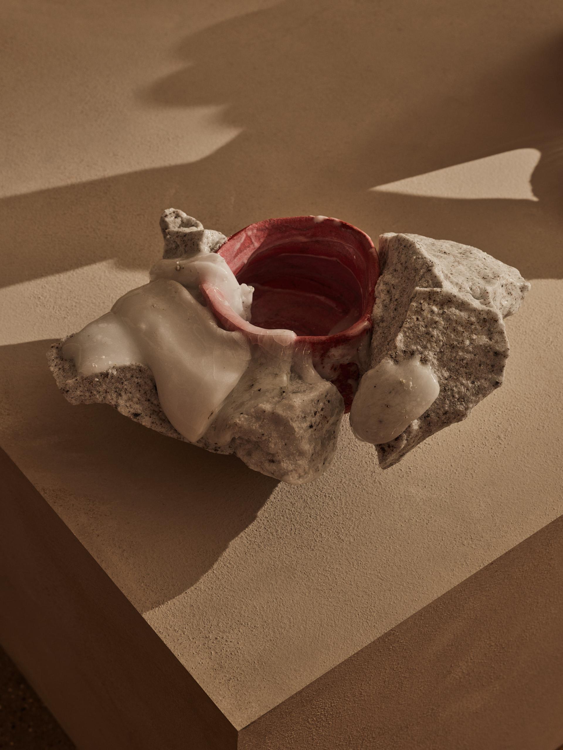 Abstract contemporary ceramic sculpture with textured surface and vibrant colors, showcased at Collect 2024 craft and design fair.