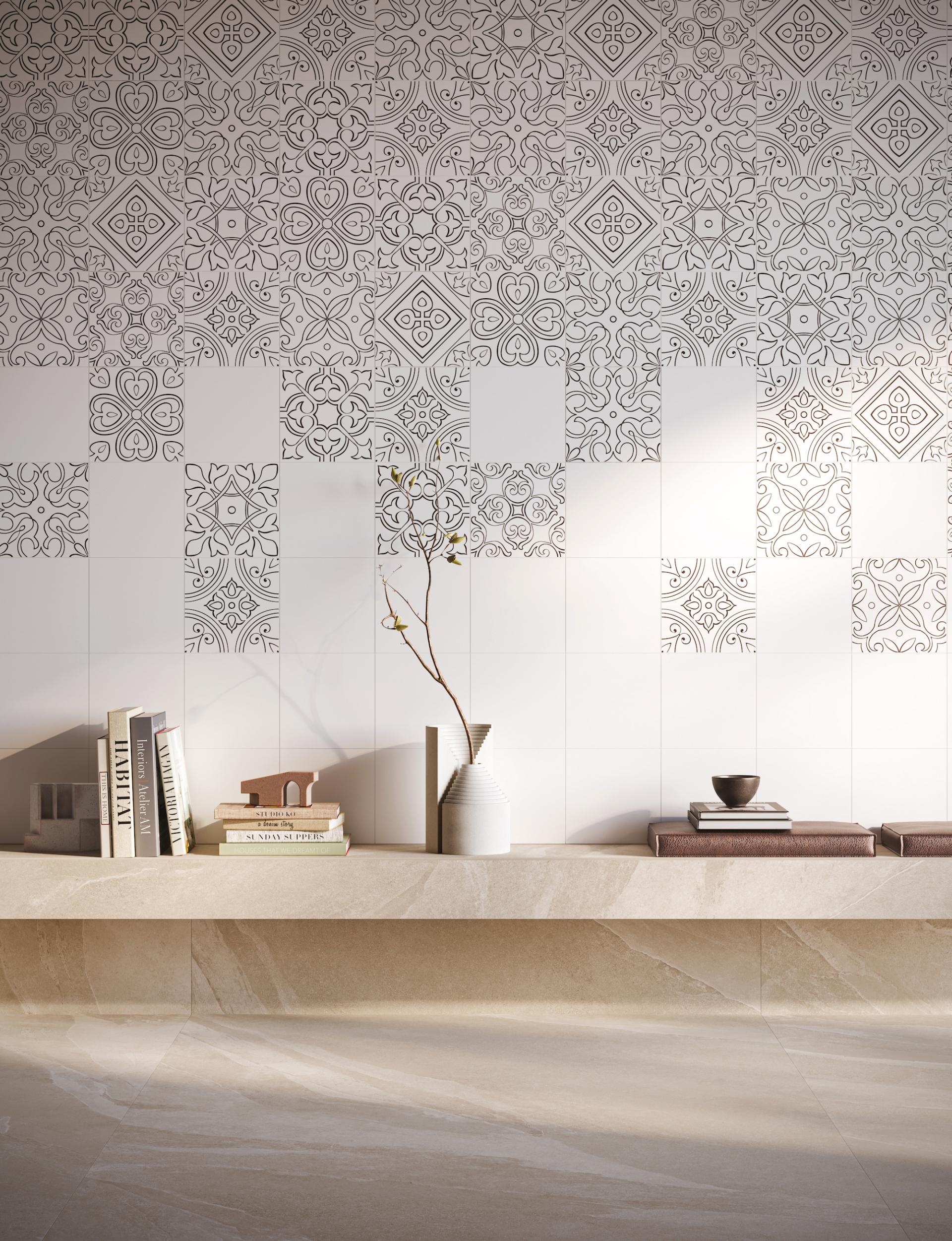 Porcelain tiles from Grestec's Silence Collection featuring intricate patterns, complemented by modern decor and natural elements.