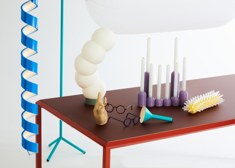 Colorful ceramics and playful design elements, including candles and decorative objects, featured at DDW 2023.
