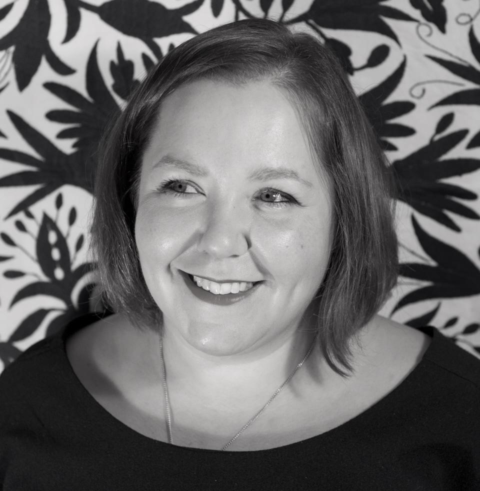 Louisa Pacifico smiling against a patterned backdrop, representing her work in craft and design at Future Icons.