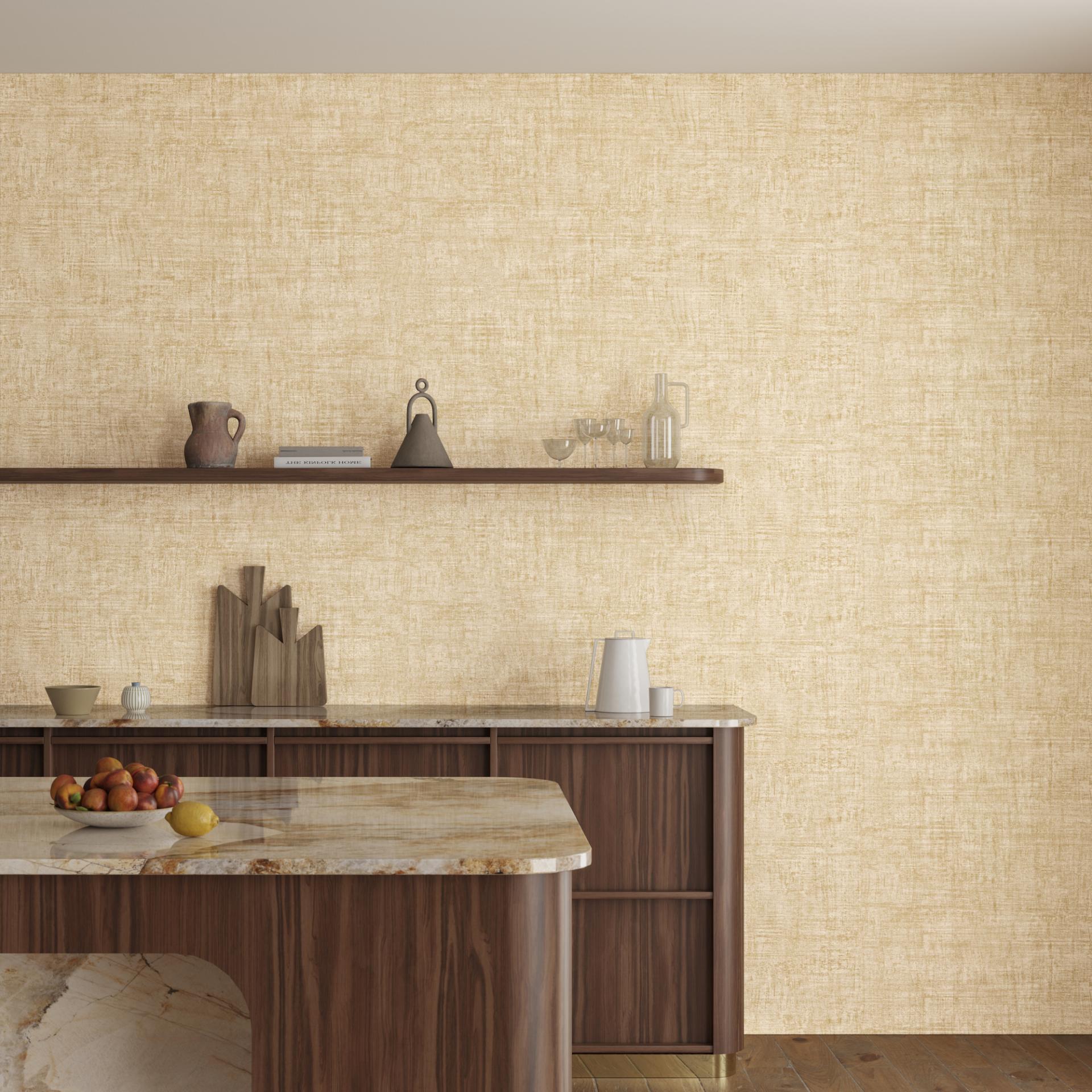 Warm-toned wall featuring washed linen texture, complementing a modern kitchen design with natural elements and autumnal decor.
