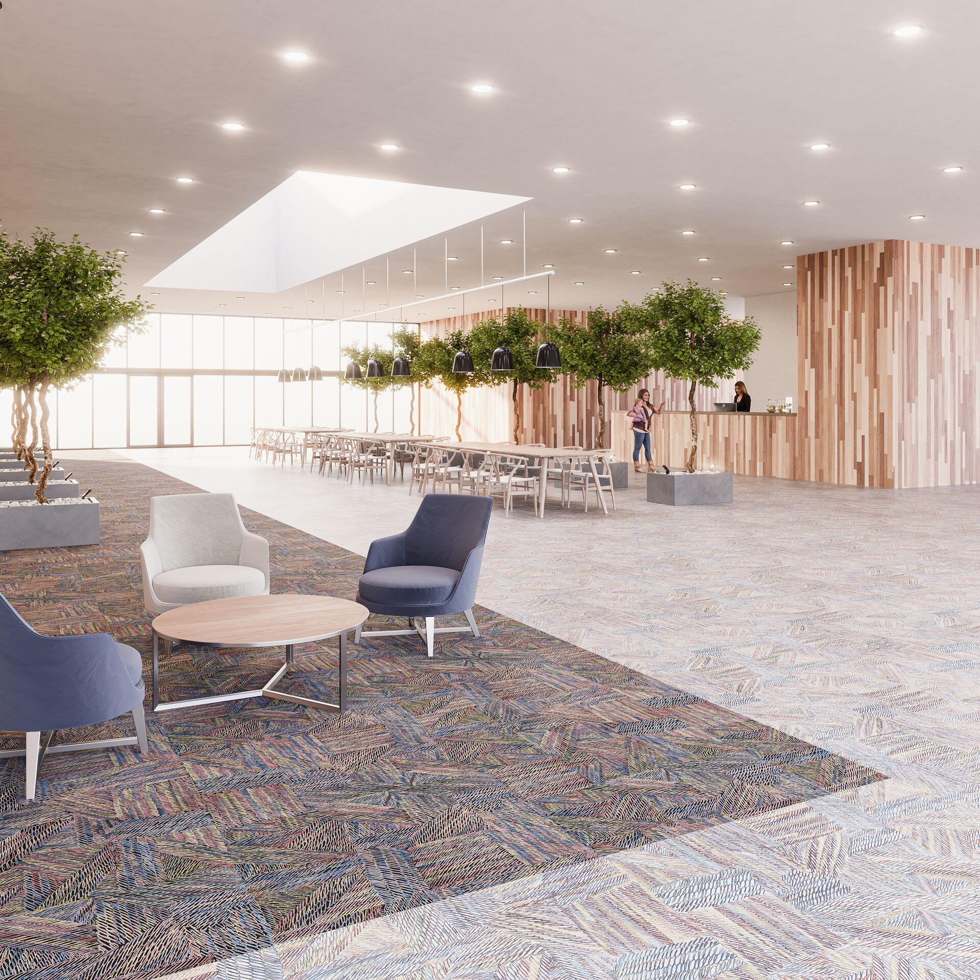 Modern interior showcasing Forbo's JM Galeote range with colorful flooring, stylish furniture, and natural elements.