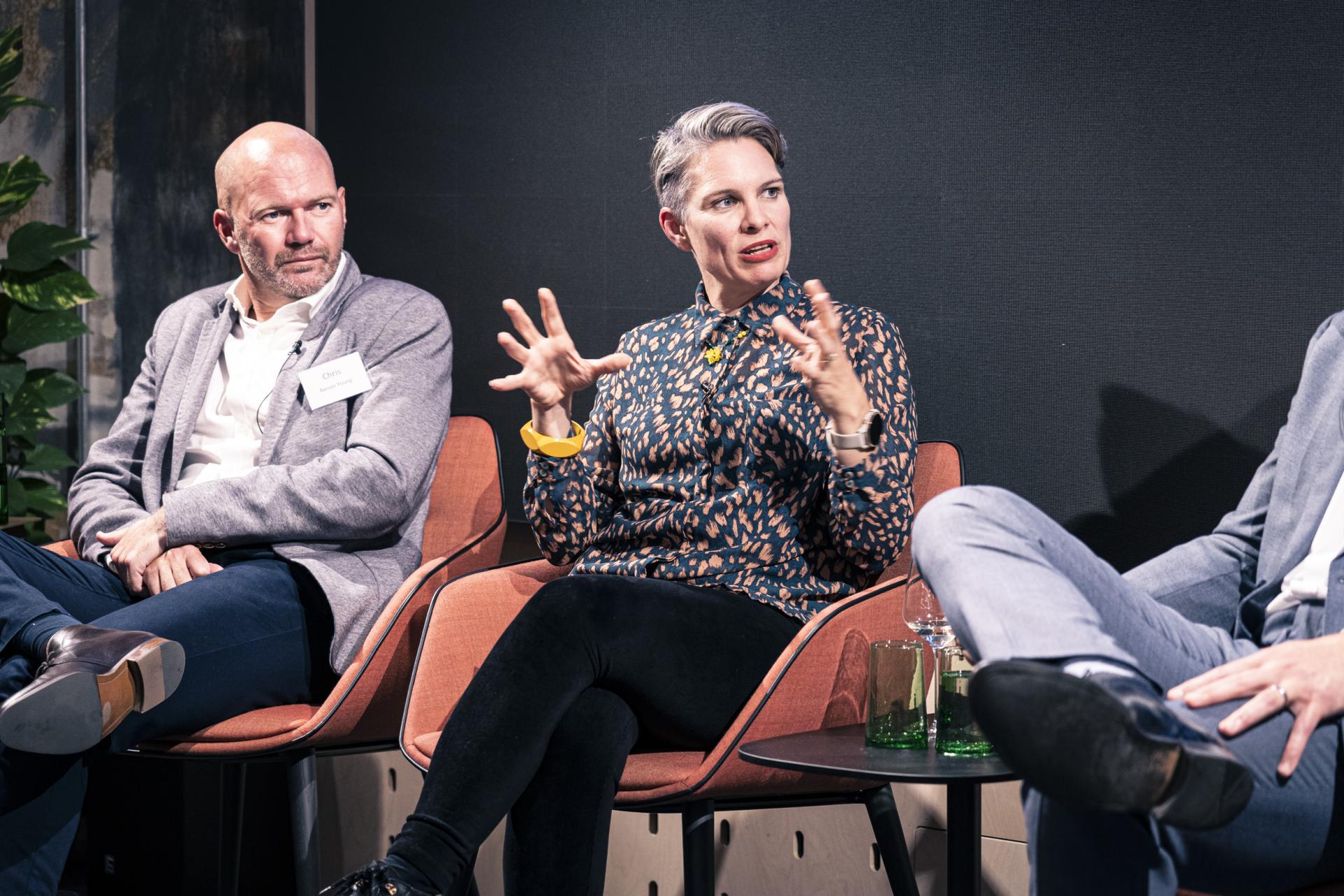 Expert panelists discussing Manchester property trends during the Material Source Studio seminar, featuring engaging conversation and insights.