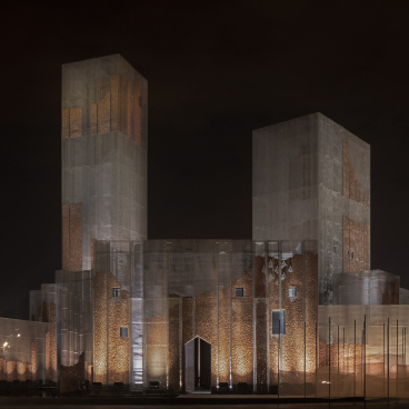 Gharfa installation by Edoardo Tresoldi illuminated at night, showcasing innovative design in Riyadh's artistic landscape.