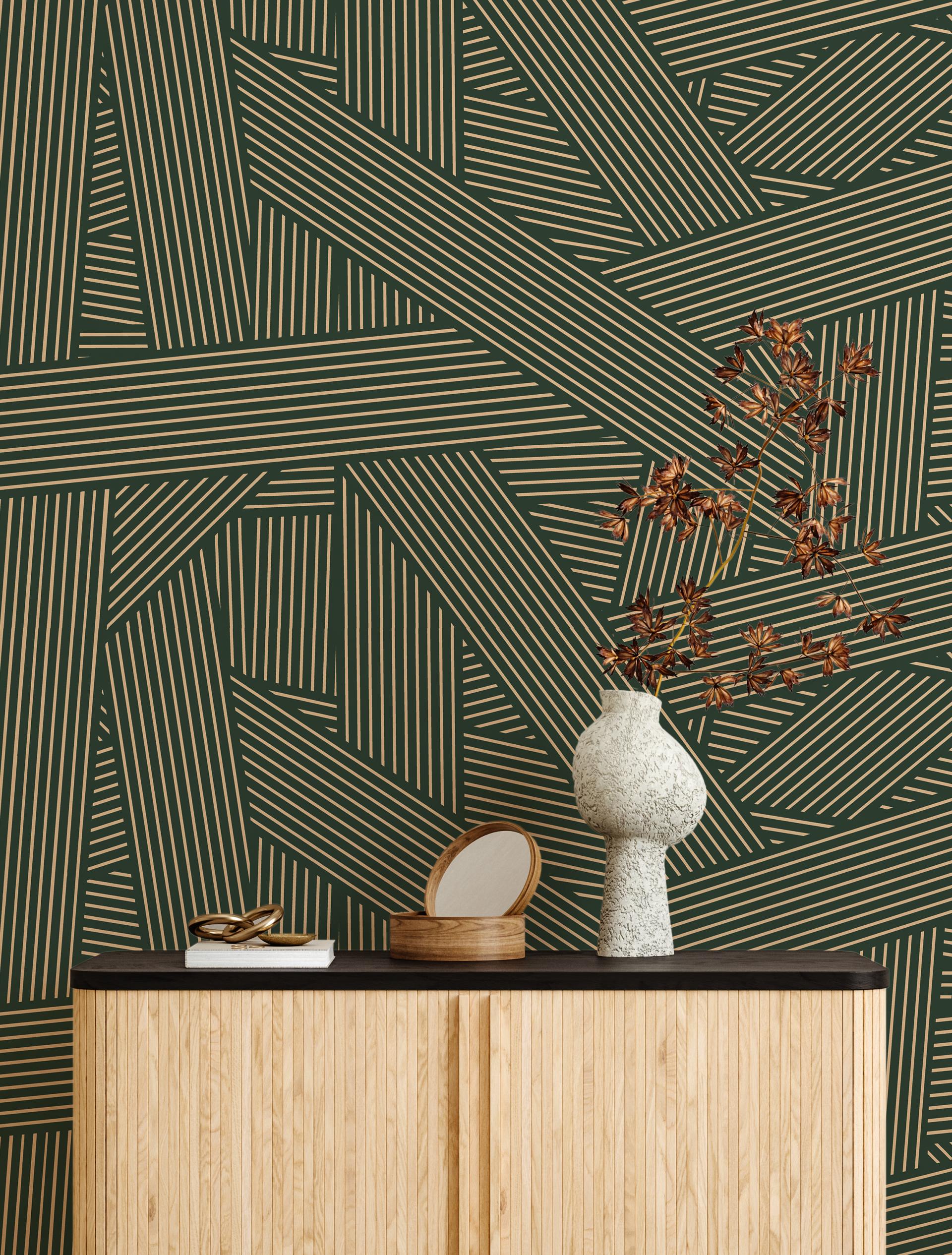 Customisable wallpaper design featuring abstract, striped patterns in green and gold, paired with decorative home decor elements.