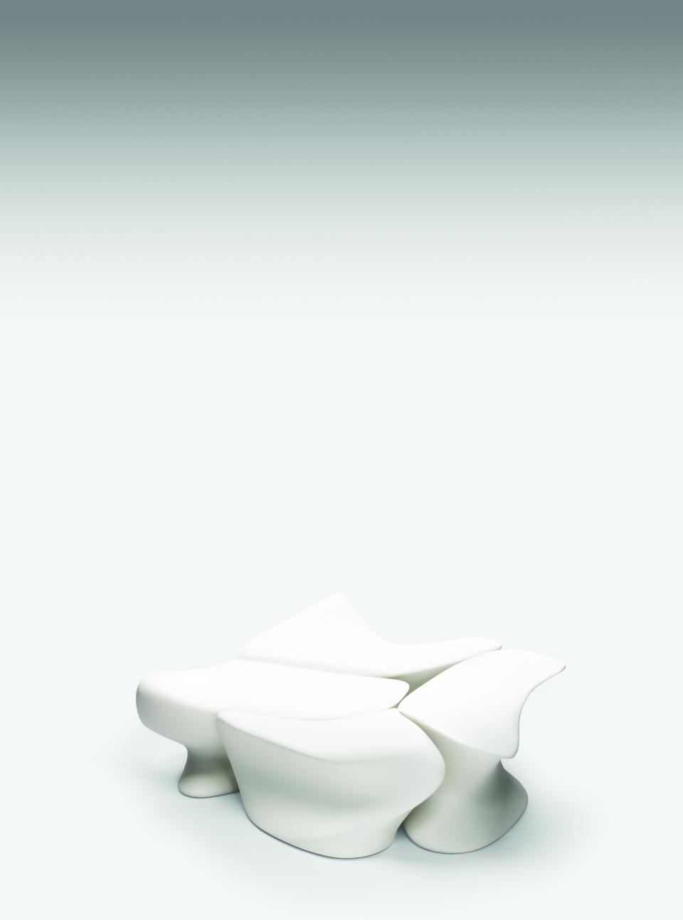 Contemporary white sculptural seating piece from Established & Sons' new designer collection, showcasing innovative British design.