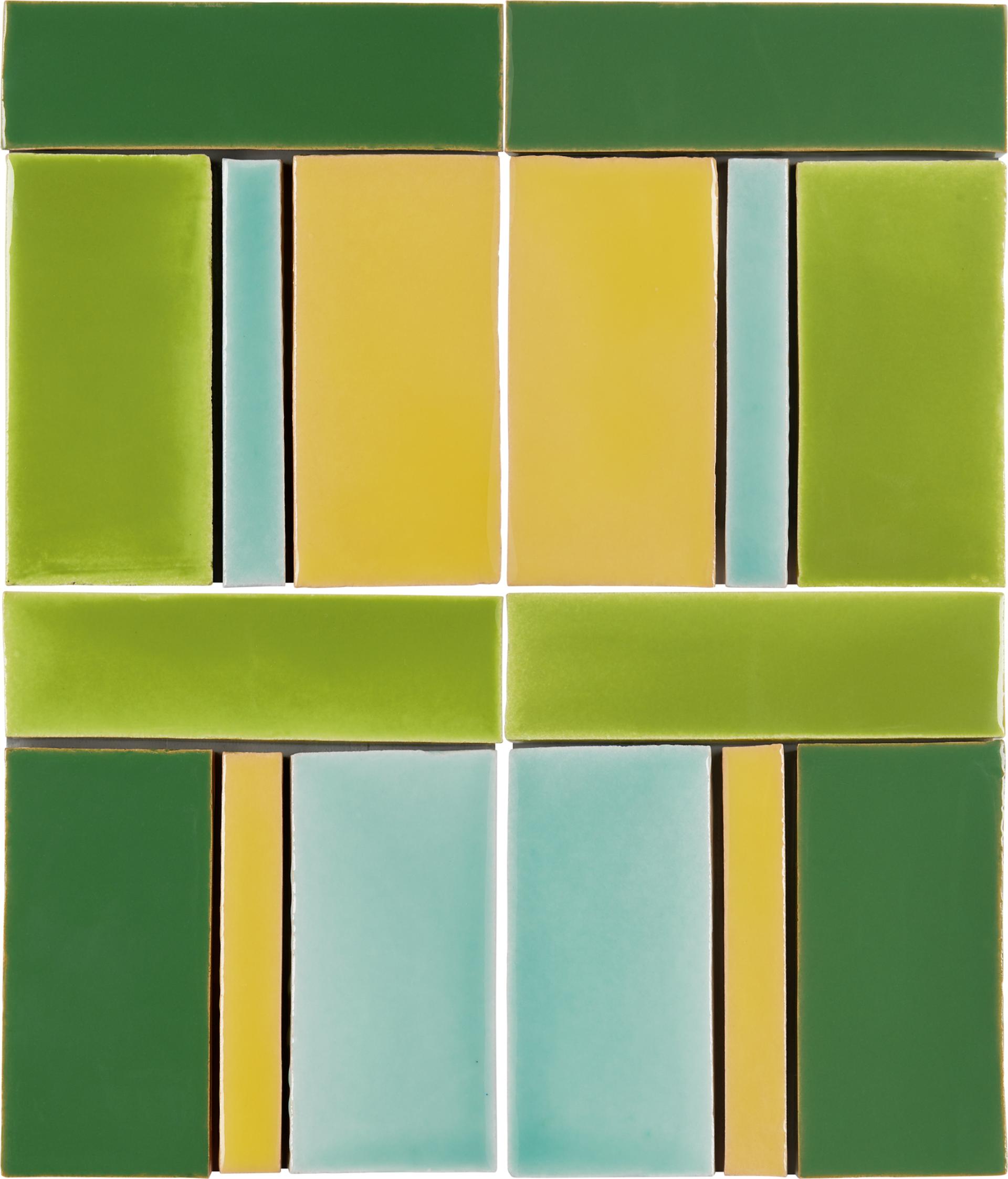 Vibrant green, yellow, and blue ceramic tiles arranged in a modern geometric pattern showcased at Clerkenwell Design Week.