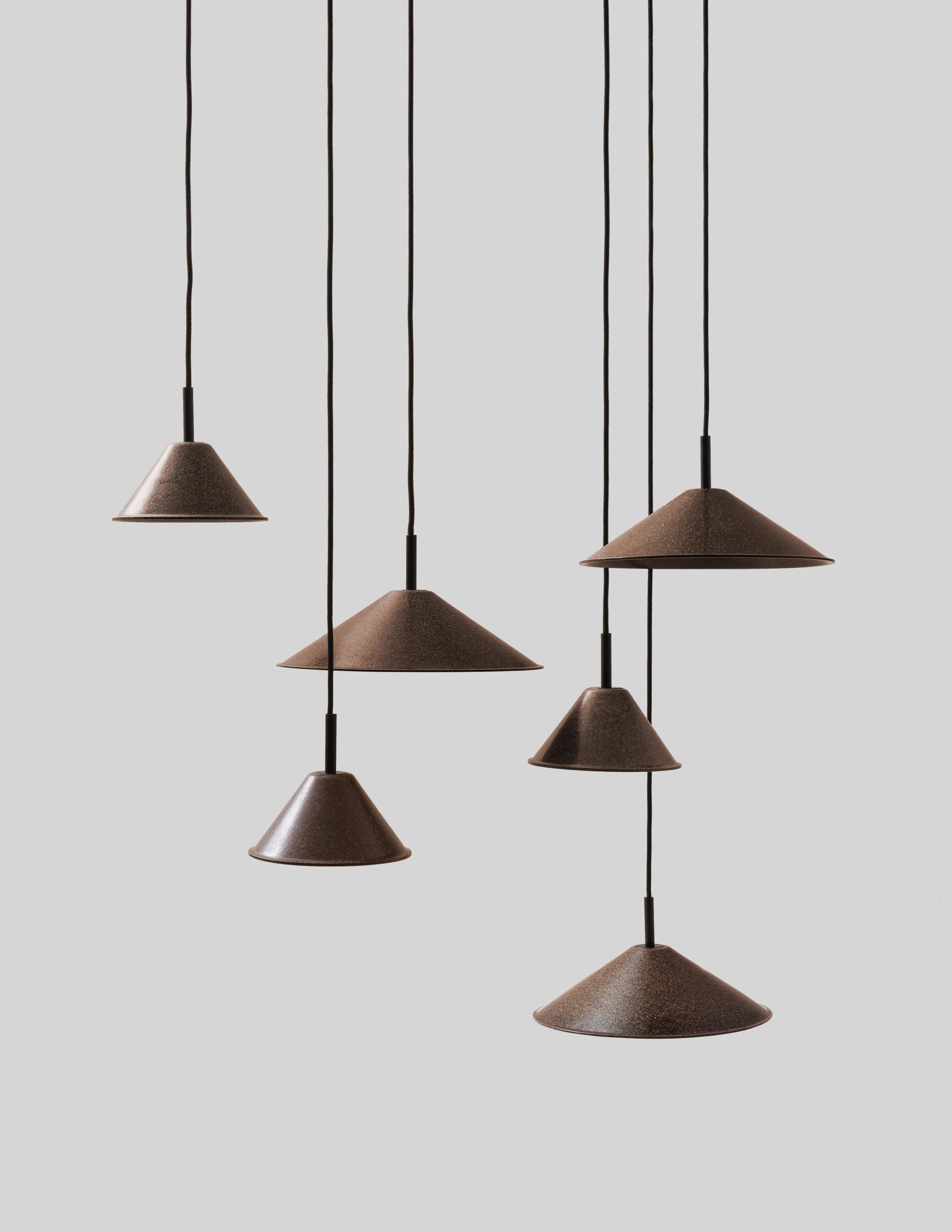 Sustainable pendant lights created by High Society, showcasing innovative Italian design with natural materials.