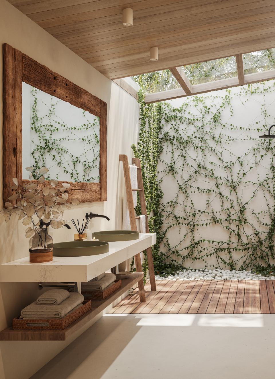 Modern bathroom featuring Caesarstone countertops, a natural wood mirror, and lush greenery against a serene, earthy backdrop.