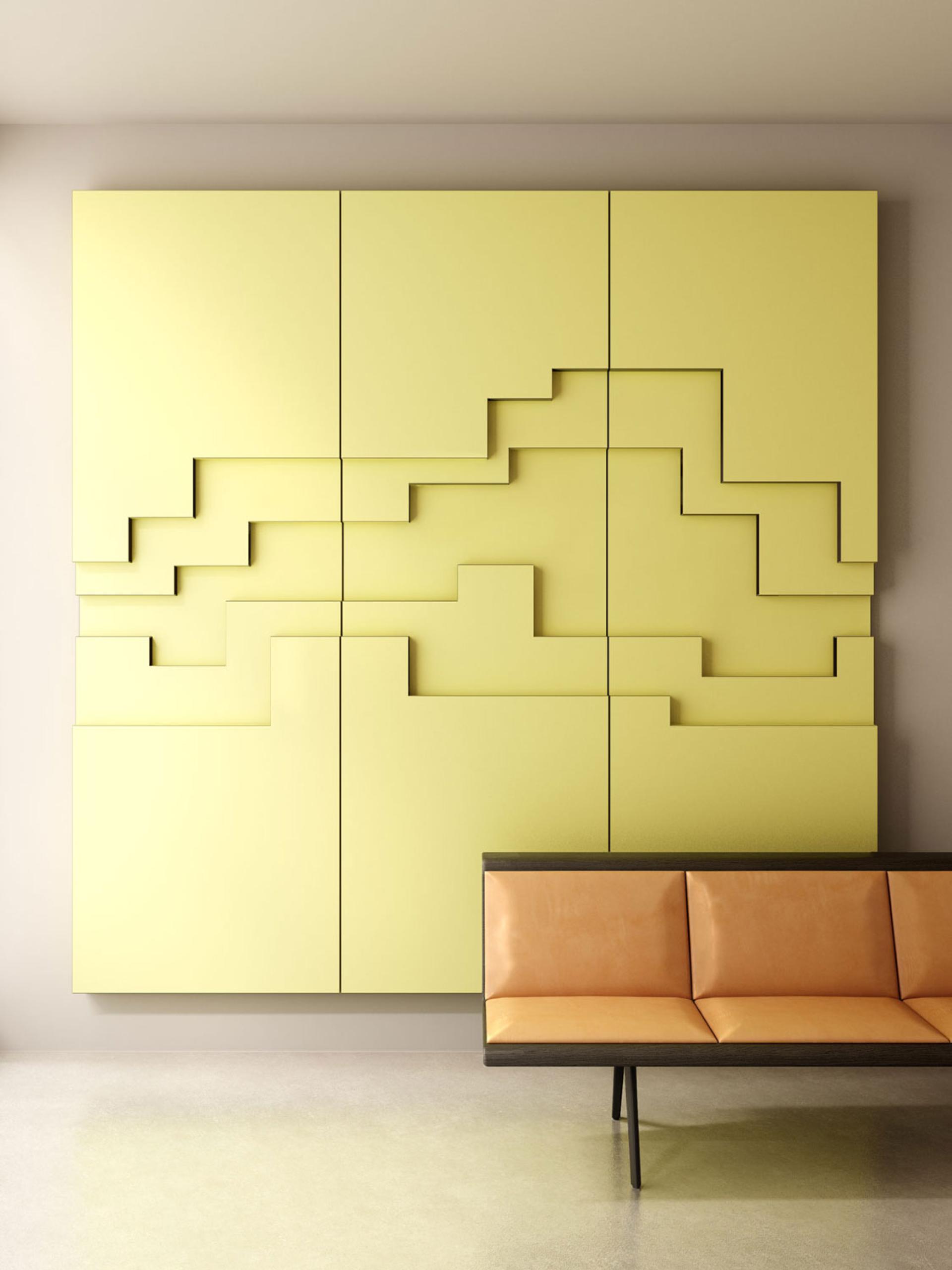 Stylish yellow Fold Panels mounted on a wall, paired with a modern brown and orange minimalist sofa.