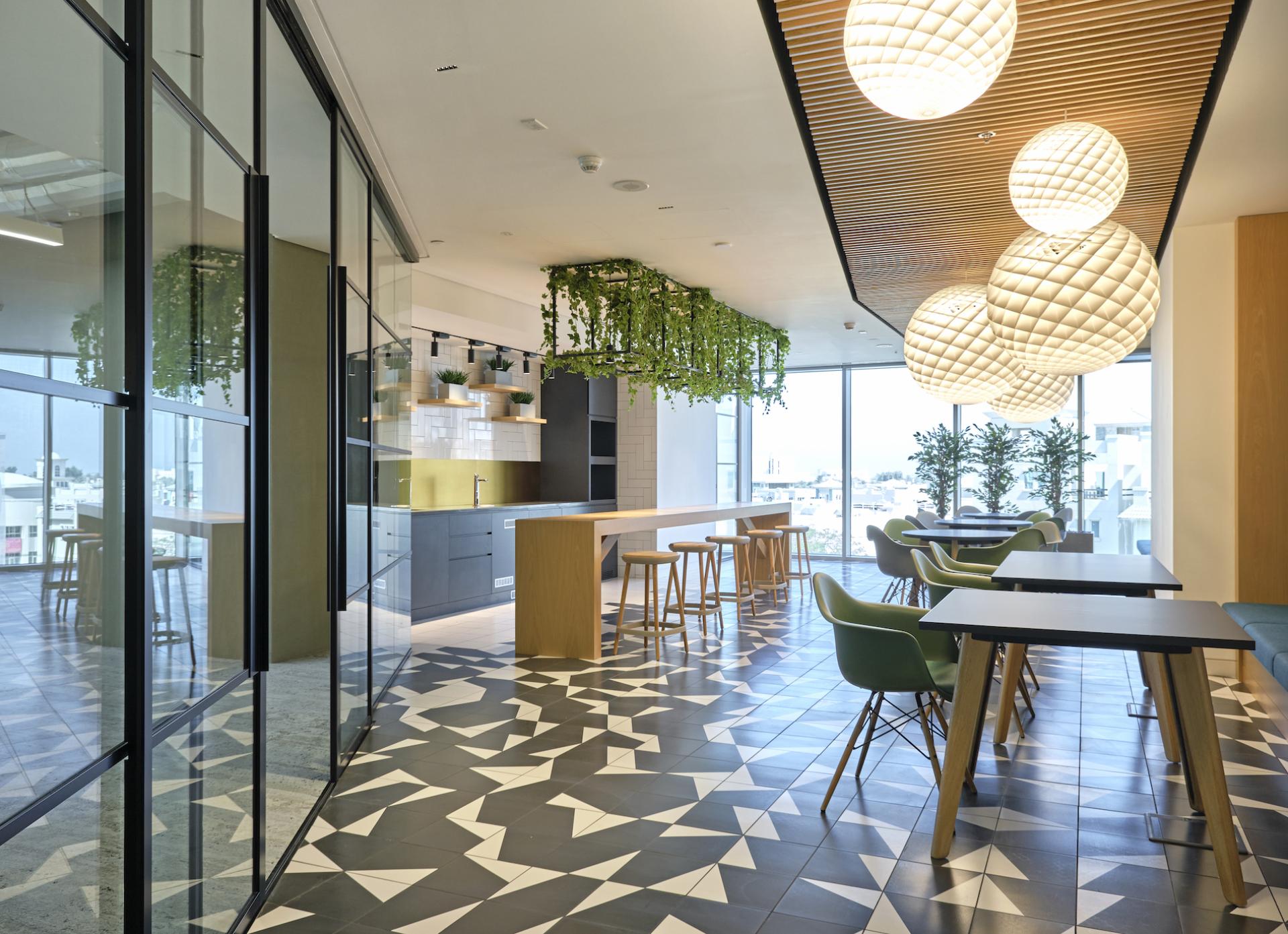 Modern study area in Heriot-Watt University's Dubai campus, featuring stylish decor and panoramic city views.