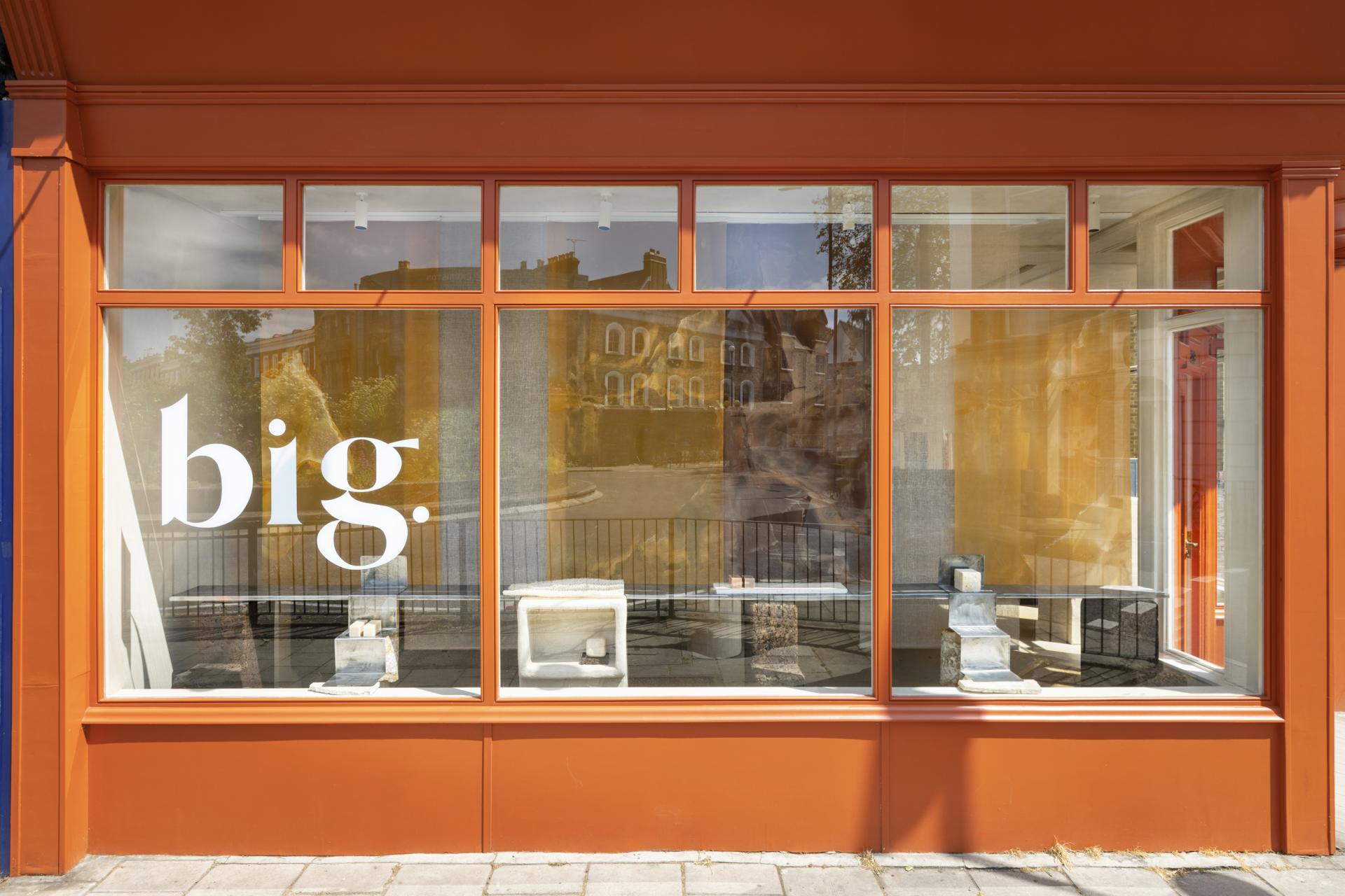 Storefront of big. in East London showcasing salvaged materials and sustainable design elements.