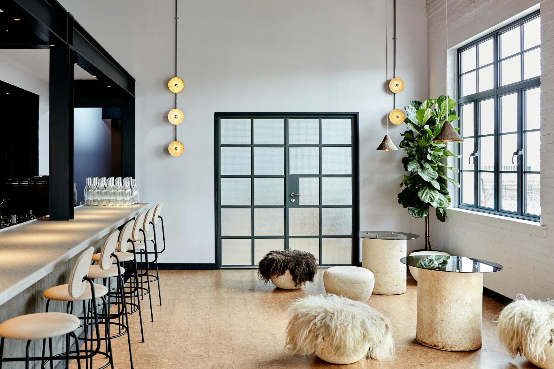 Stylish interior of Silo restaurant, featuring eco-friendly furnishings and a warm, inviting atmosphere designed by Nina+Co.