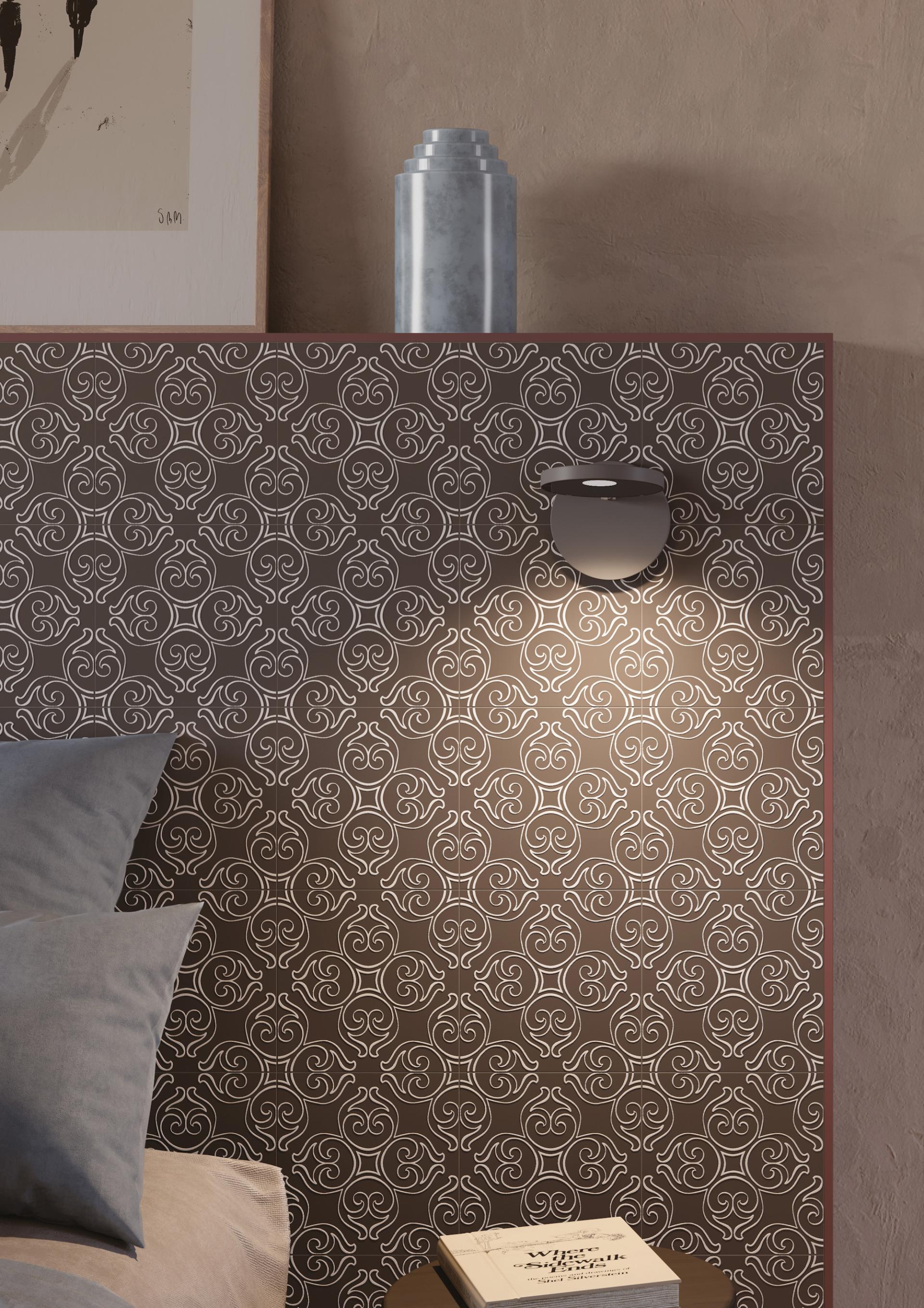 Elegant porcelain tile design from Grestec's Silence Collection, featuring intricate patterns and modern lighting in a cozy setting.