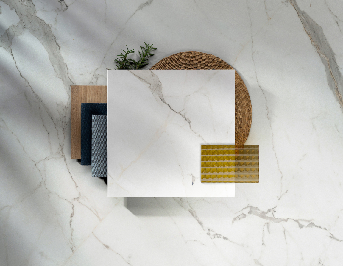 Stylish Dekton® surface paired with fabric samples and decor items, showcasing the new Onirika and Kraftizen collections by Cosentino.