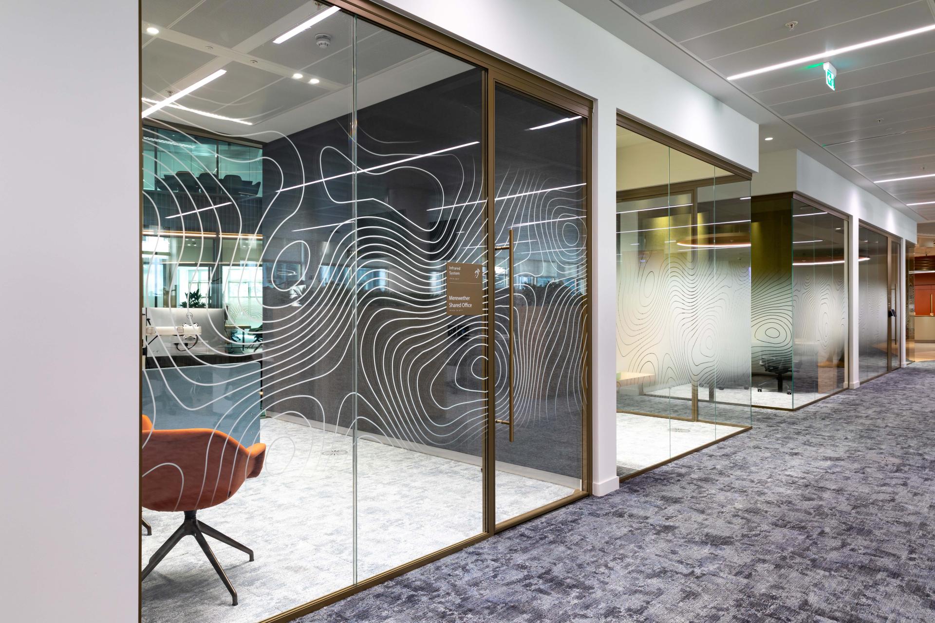 Radii supports tp bennett & Overbury with bespoke bronze framed glazed partitions at banking HQ in London.