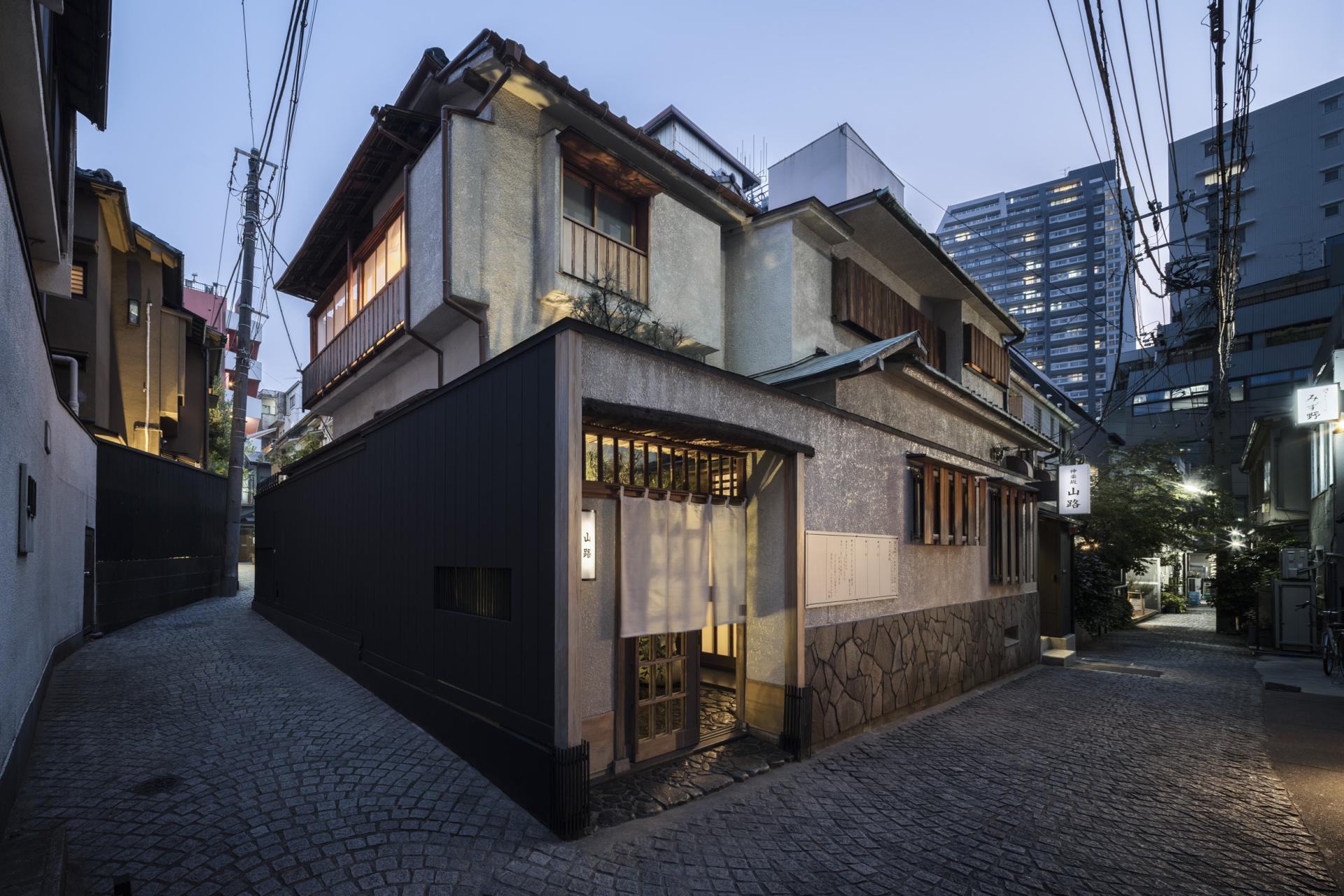 Charming exterior of TRUNK(HOUSE) in Kagurazaka, Tokyo, blending traditional and modern architectural elements.
