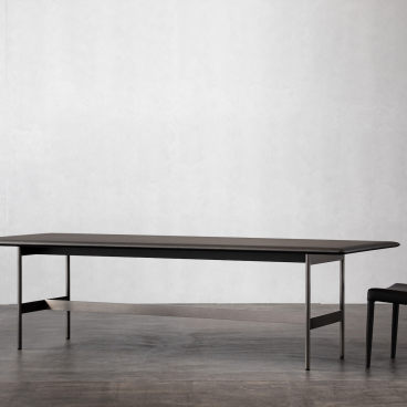 Modern minimalist dining table and chair showcasing Ritzwell's blend of Japanese design and functionality.