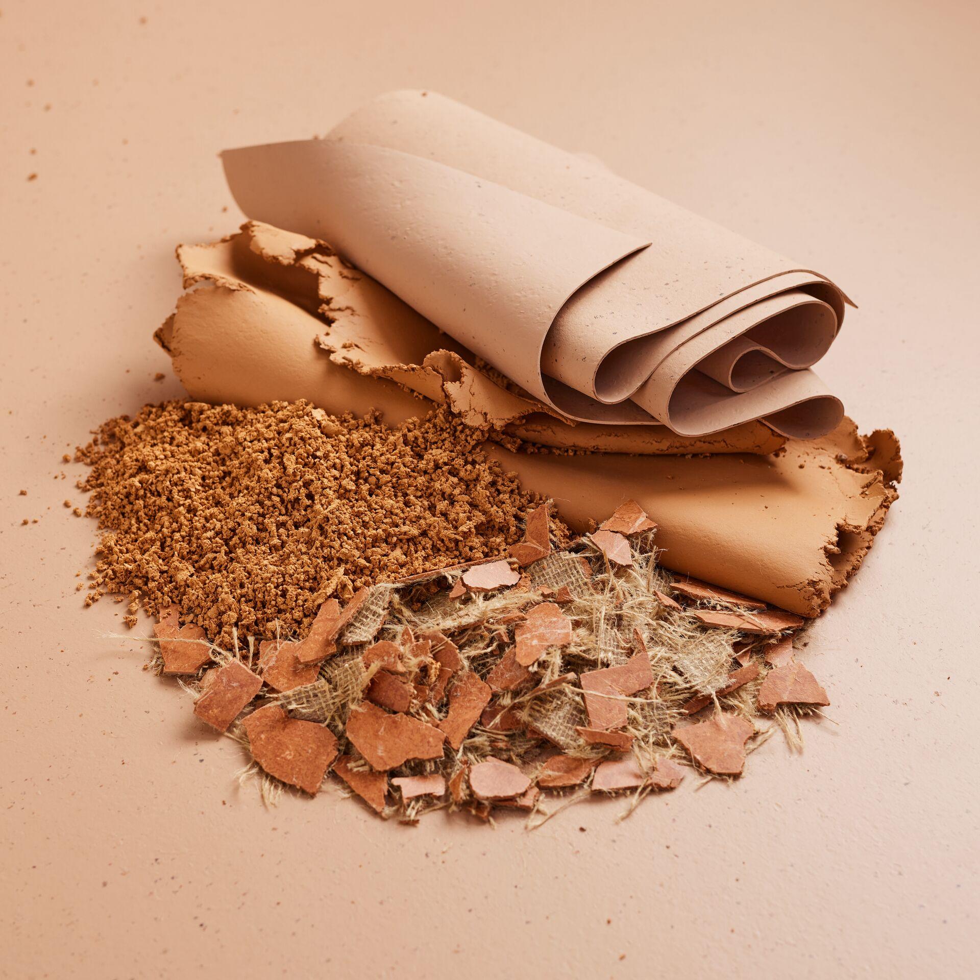 Natural materials showcasing the eco-friendly components of Forbo’s refreshed Marmoleum Cocoa collection for sustainable flooring.