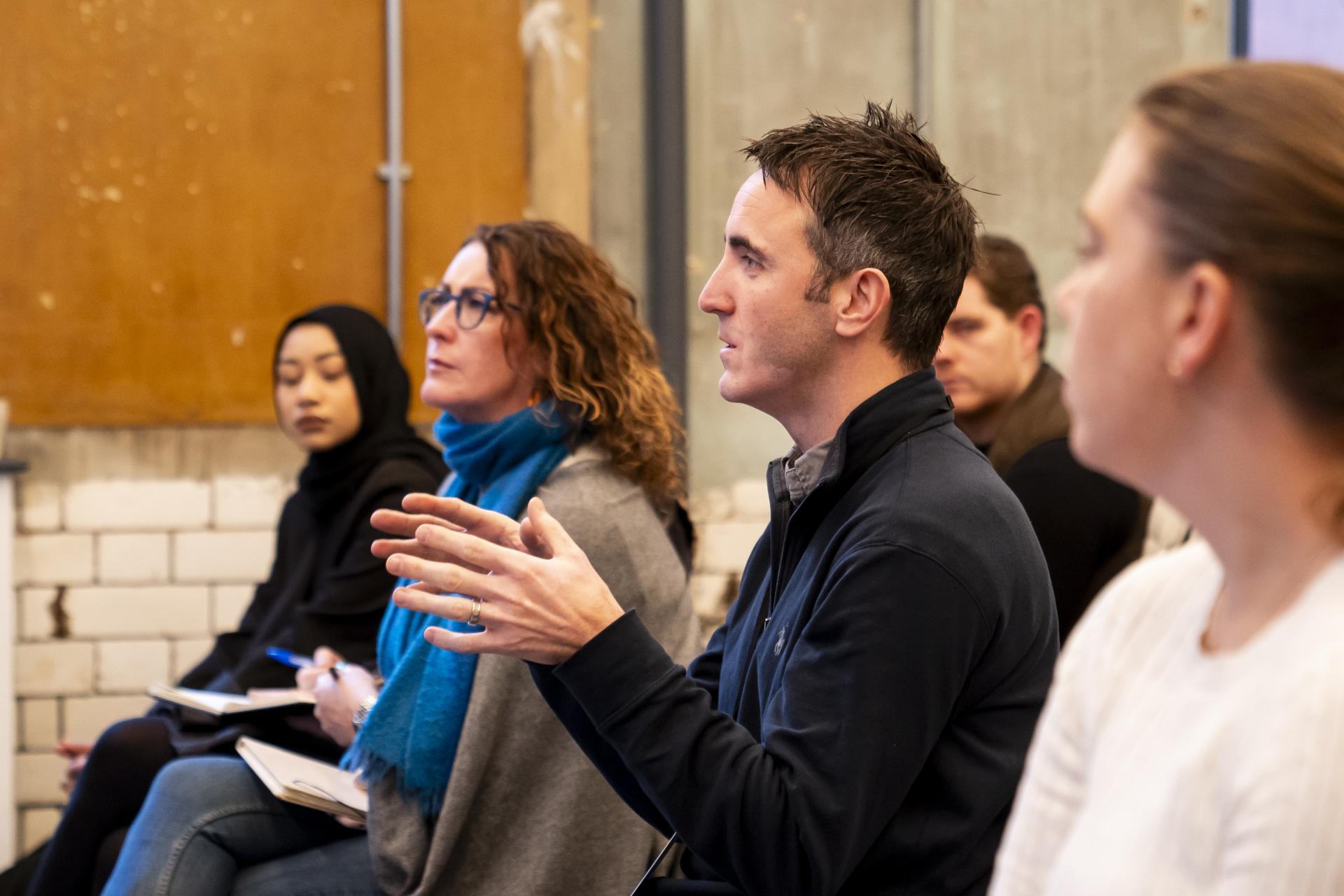 Discussion among attendees at a seminar on graphene technology and innovation hosted by the Graphene Engineering Innovation Centre.