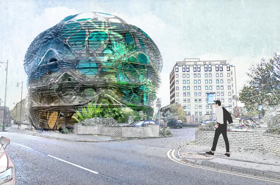 Modern architectural design of the Manchester School of Art building surrounded by urban streetscape and greenery.