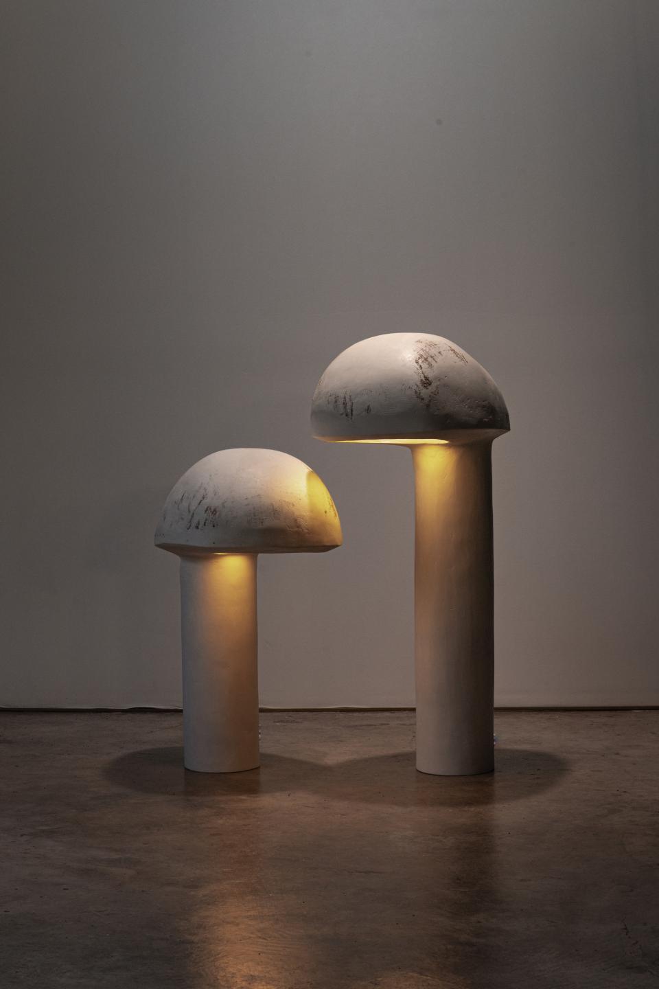 Sculptural light installations resembling mushrooms, showcasing Reynold Rodriguez's innovative art at the Charles Burnand Gallery.