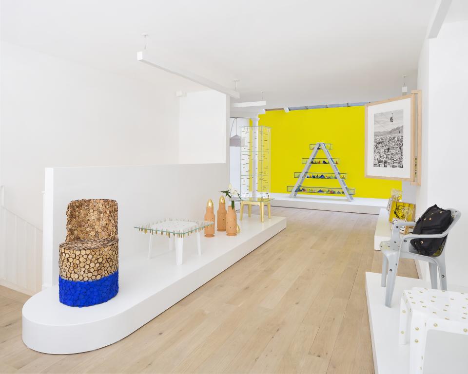 Innovative interior featuring colorful furniture and installation design, reflecting Brazil's rainforest vulnerability at London Design Biennale 2018.