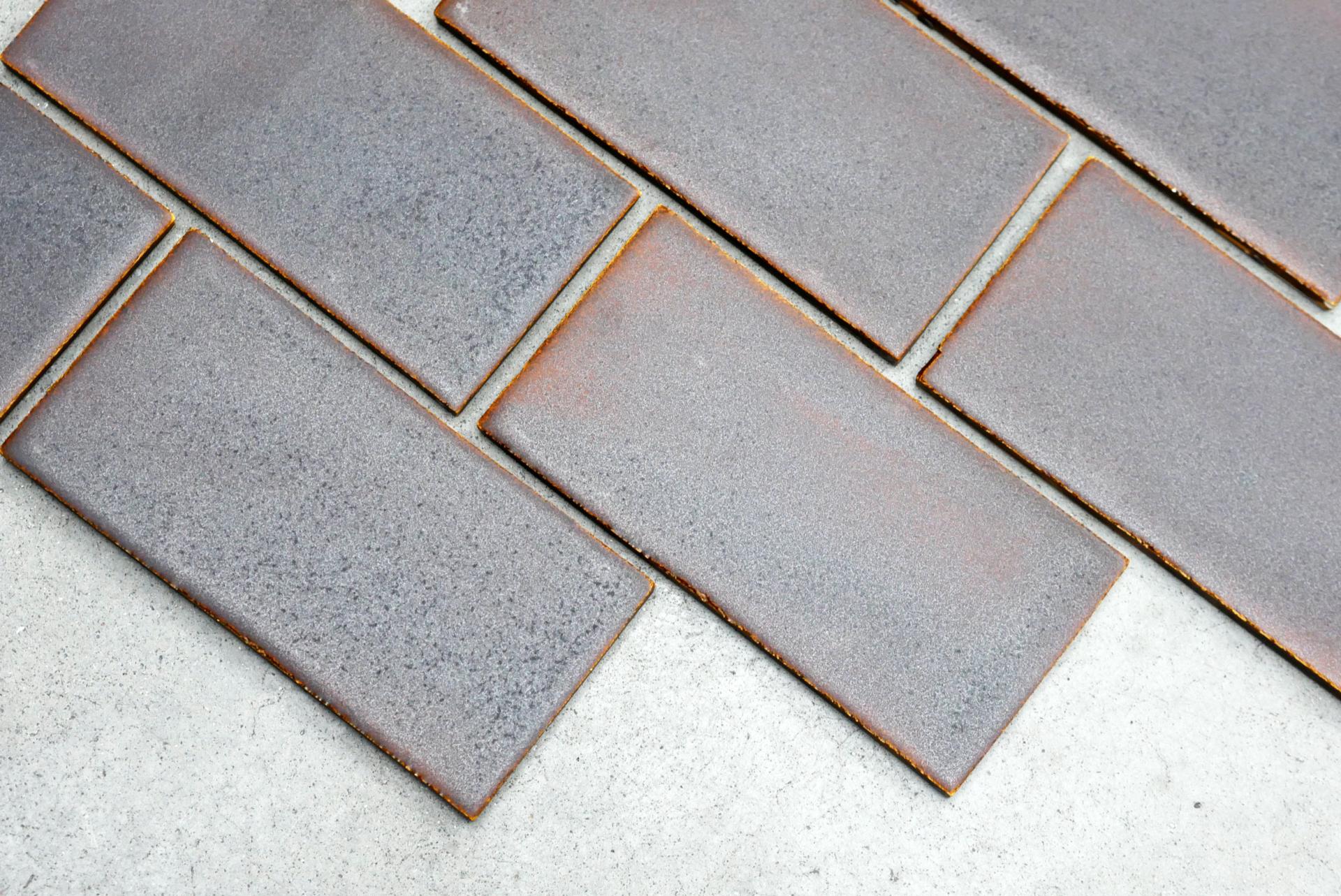 Recycled ceramic tiles in a modern design showcasing sustainable material use and innovative waste re-identification.