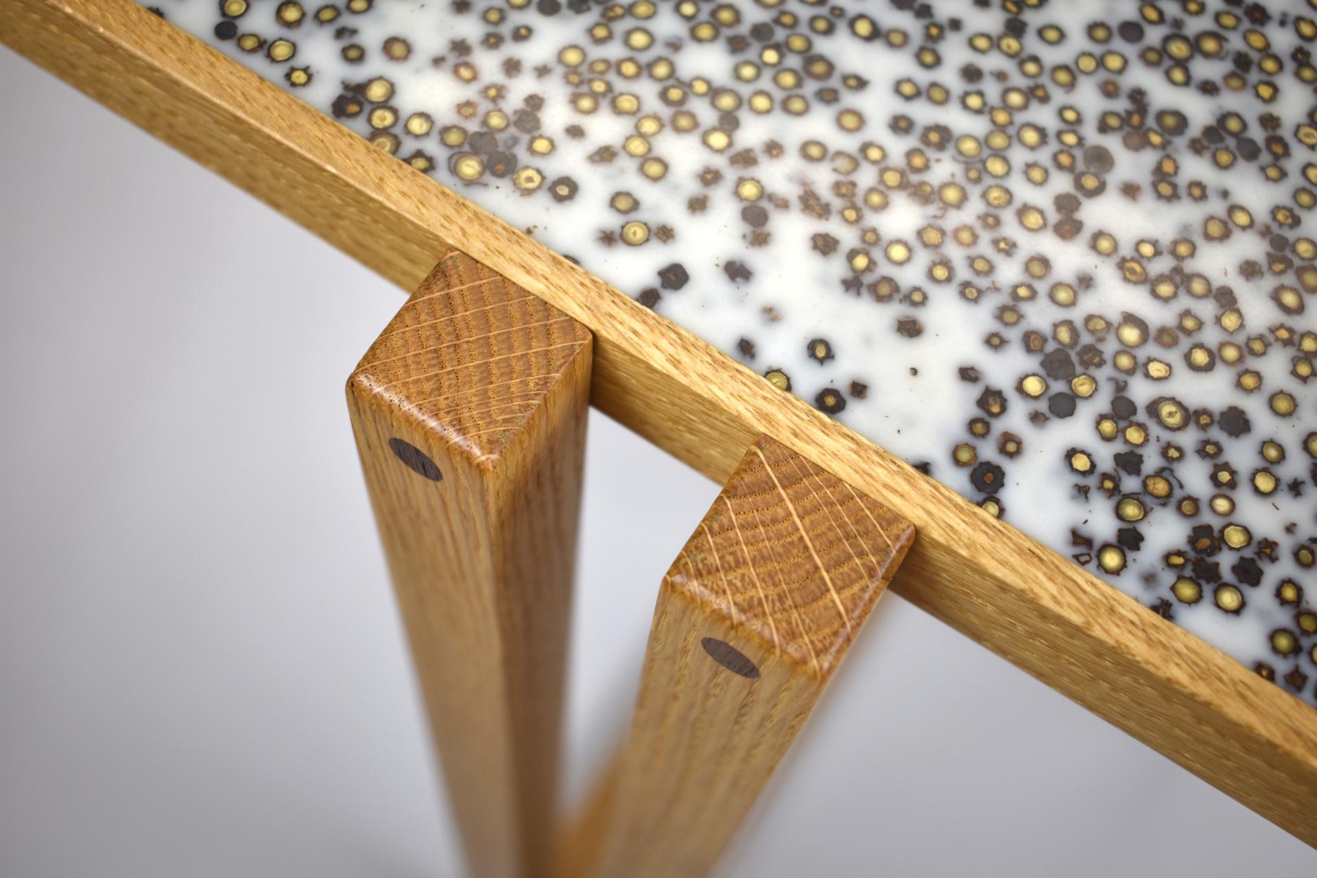 Contemporary wooden furniture featuring a unique surface design with intricate patterns, showcased at London Craft Week 2020.