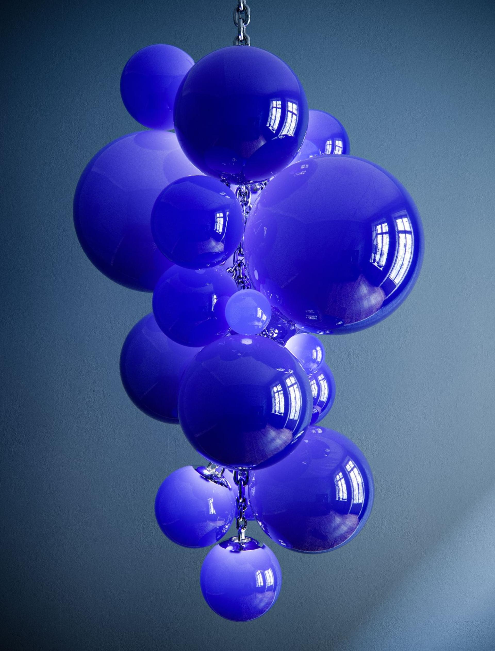 Sculptural blue glass Kuulas chandelier by Cameron Design House, creating a bold and elegant lighting statement.