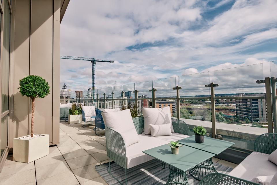 Stylish rooftop terrace featuring modern seating and greenery, designed for new residential amenity spaces at The Headline, Leeds.