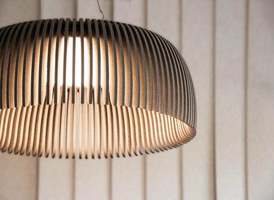 Handcrafted lumenear acoustic lamp featuring a stylish wooden design that blends elegance with sound absorption.