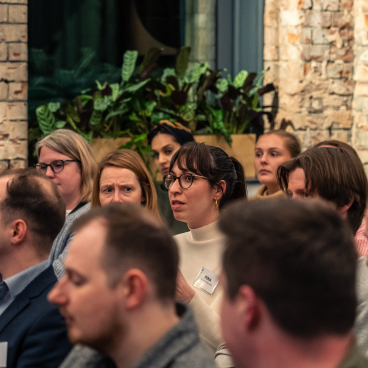 Audience members engaged in discussion at the Material Source Studio seminar on sustainability in Manchester.
