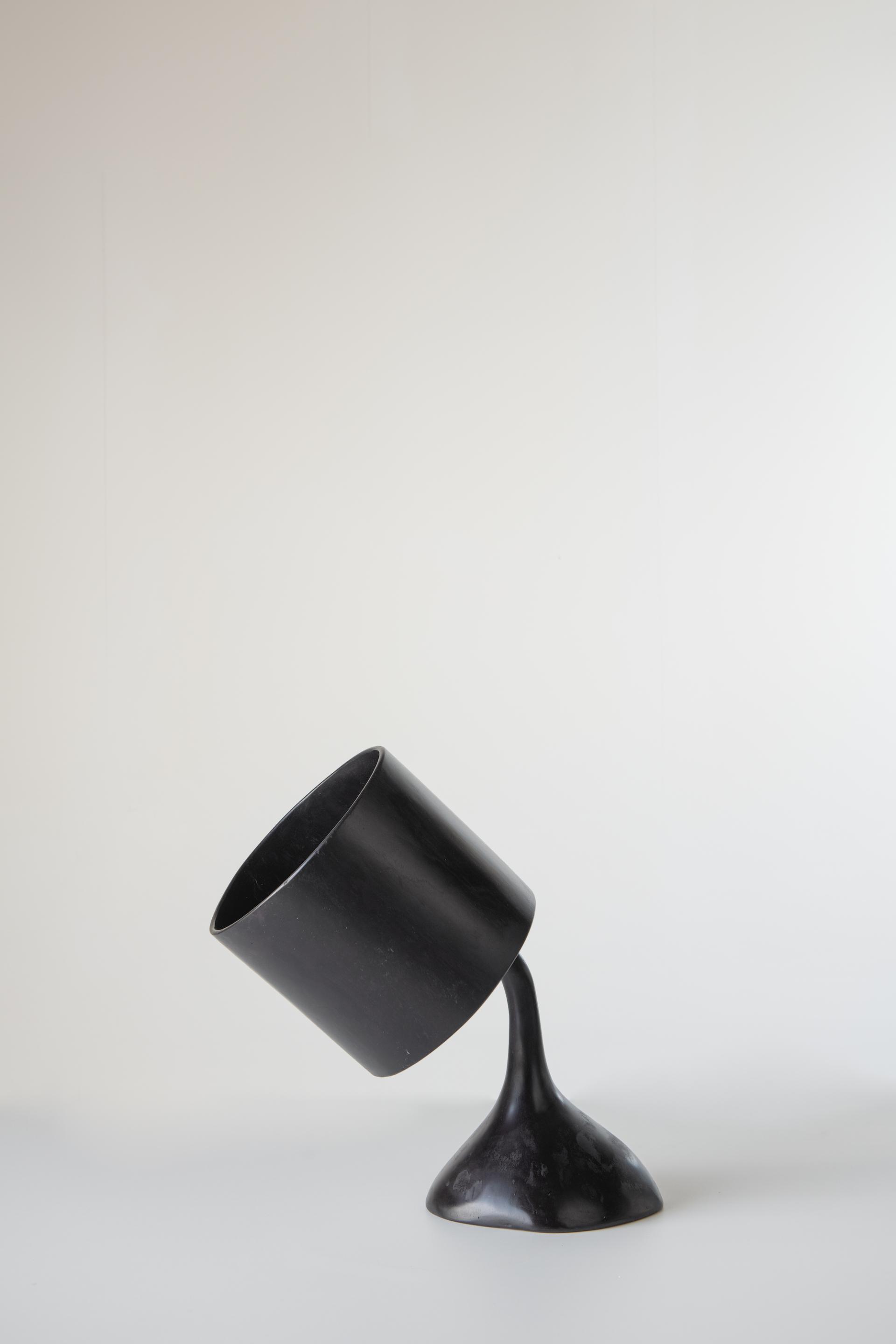 Sculptural black artwork from Reynold Rodriguez's solo show at Charles Burnand Gallery, showcasing modern design elements.