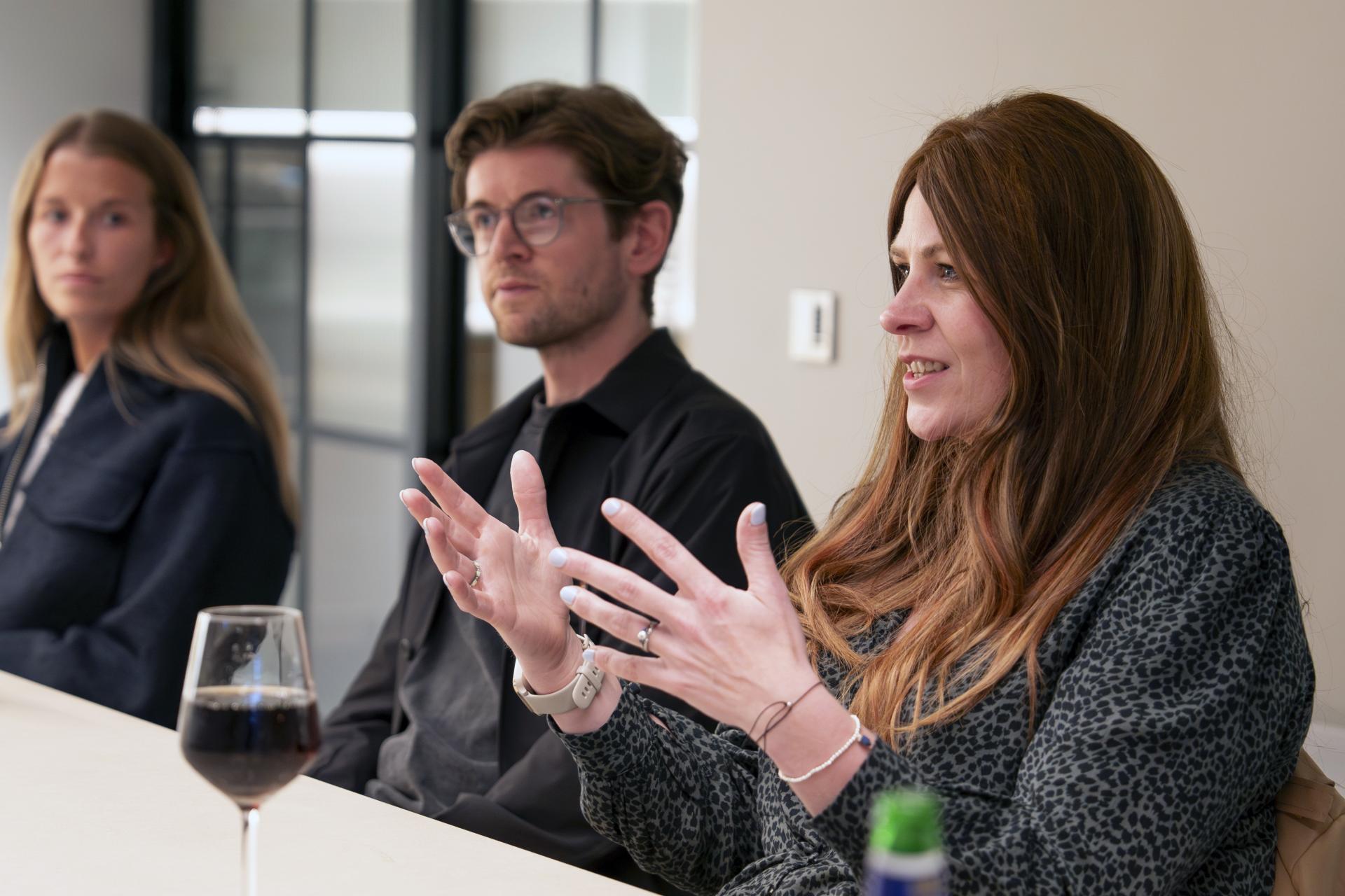 Participants engage in a lively discussion during a roundtable on Manchester's residential property landscape.