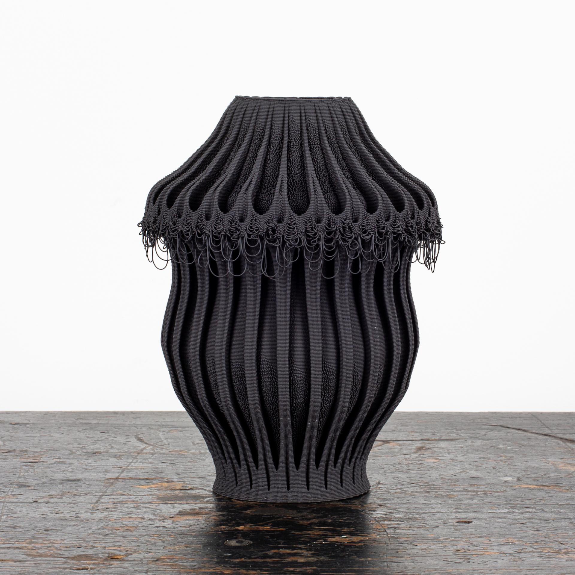 Stylish black 3D-printed vase with unique textured design showcased at Cockpit Arts Summer Festival 2021.